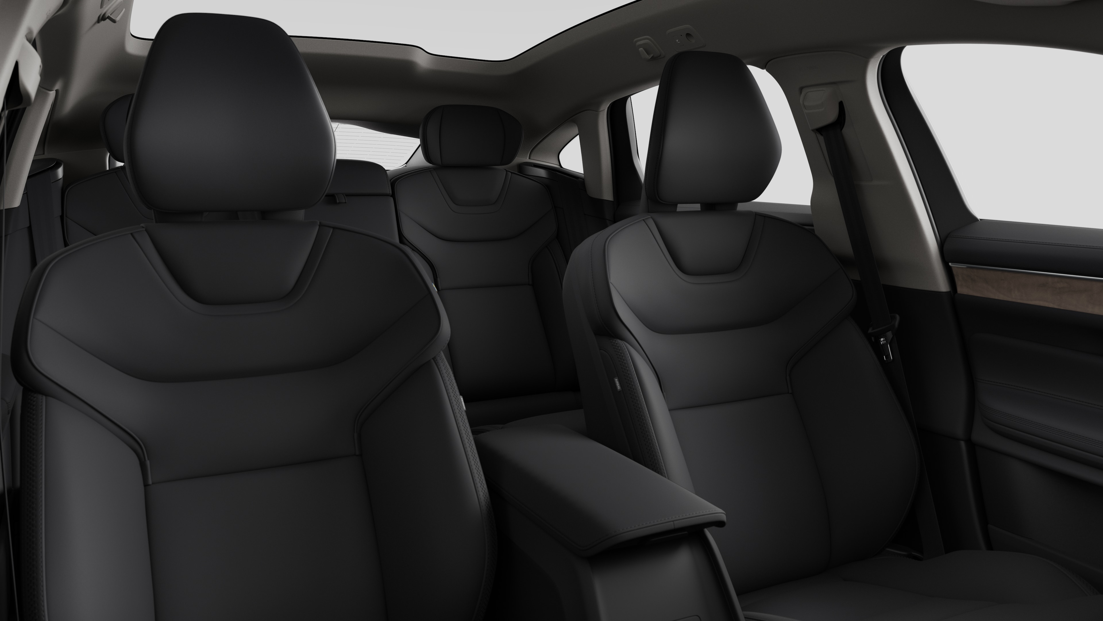 Volvo car interior showing rear passenger seats and center console in plain studio background.