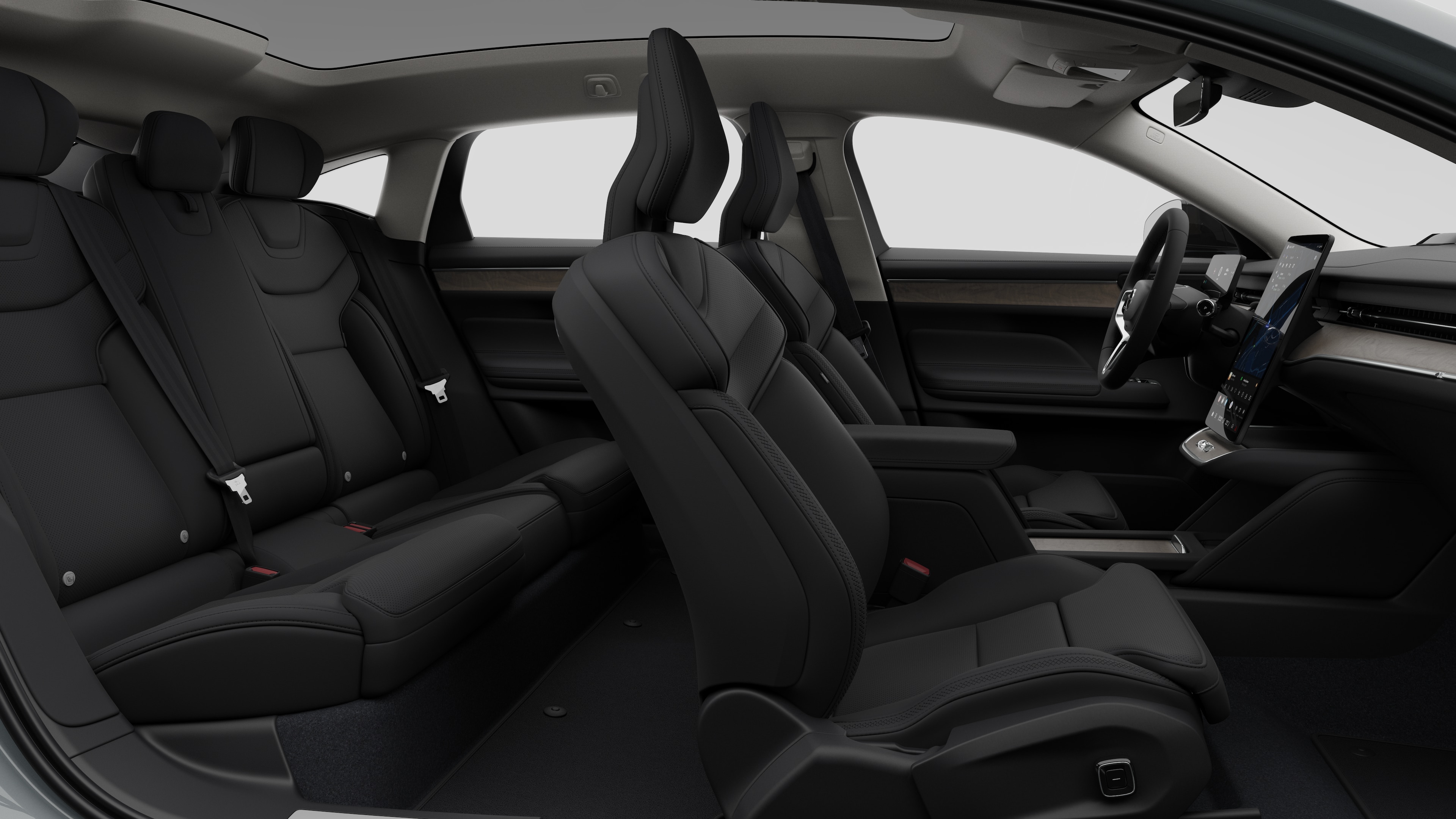 Zijaanzicht van het interieur van een Volvo met voorstoelen, passagiersstoelen achterin, stuurwiel, dashboard en middenconsole, tegen een effen studioachtergrond.