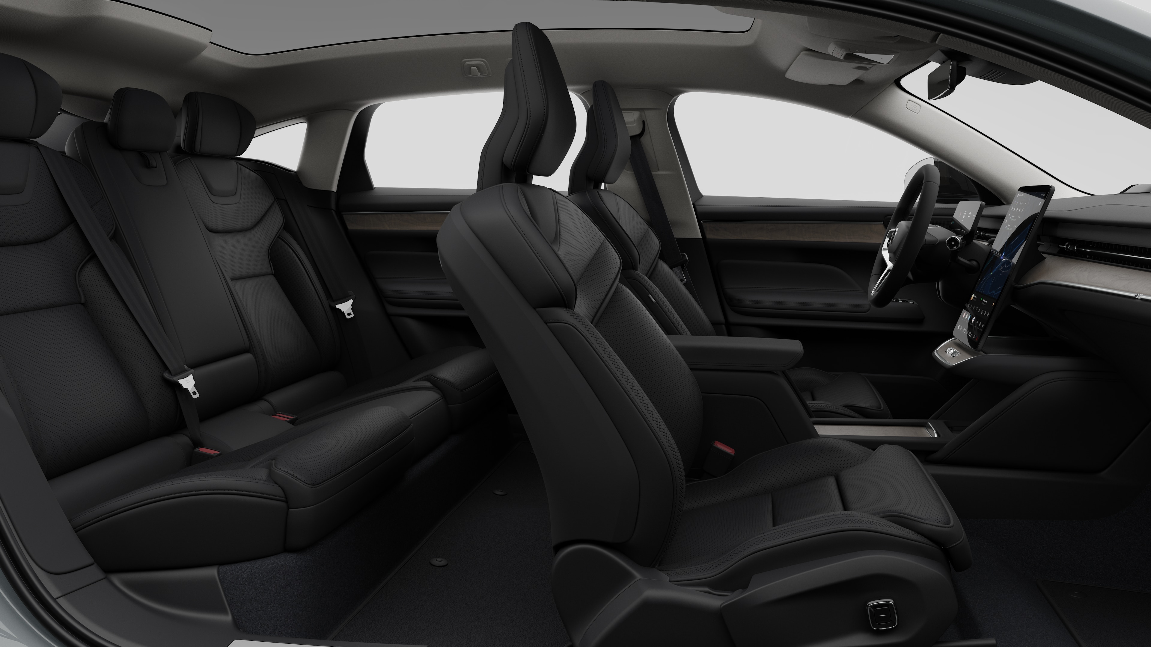 Zijaanzicht van het interieur van een Volvo met de voorstoelen, de passagiersstoelen achterin, het stuur, het dashboard en de middenconsole, tegen een effen studioachtergrond.