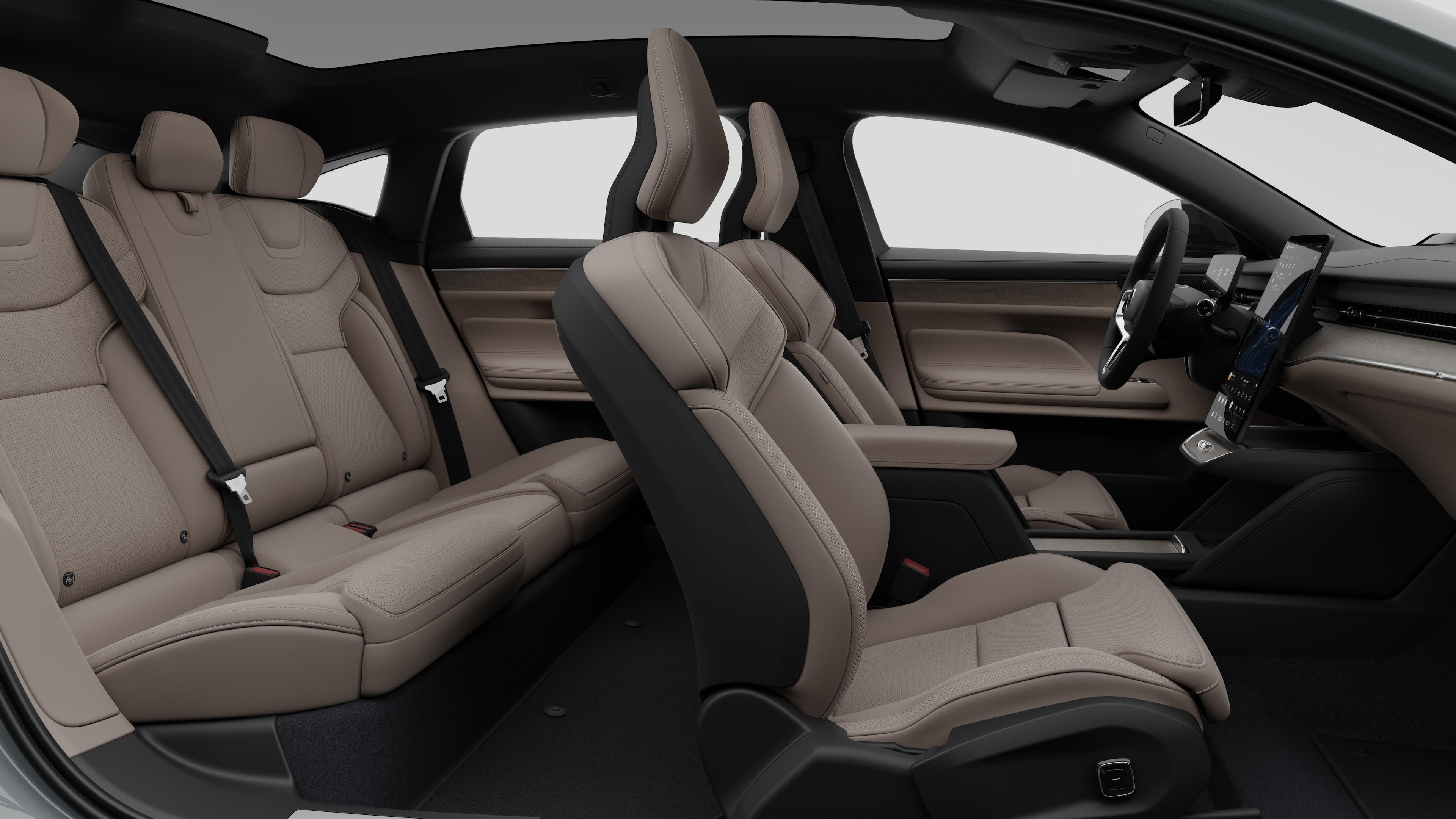 Zijaanzicht van het interieur van een Volvo met voorstoelen, passagiersstoelen achterin, stuurwiel, dashboard en middenconsole, tegen een effen studioachtergrond.