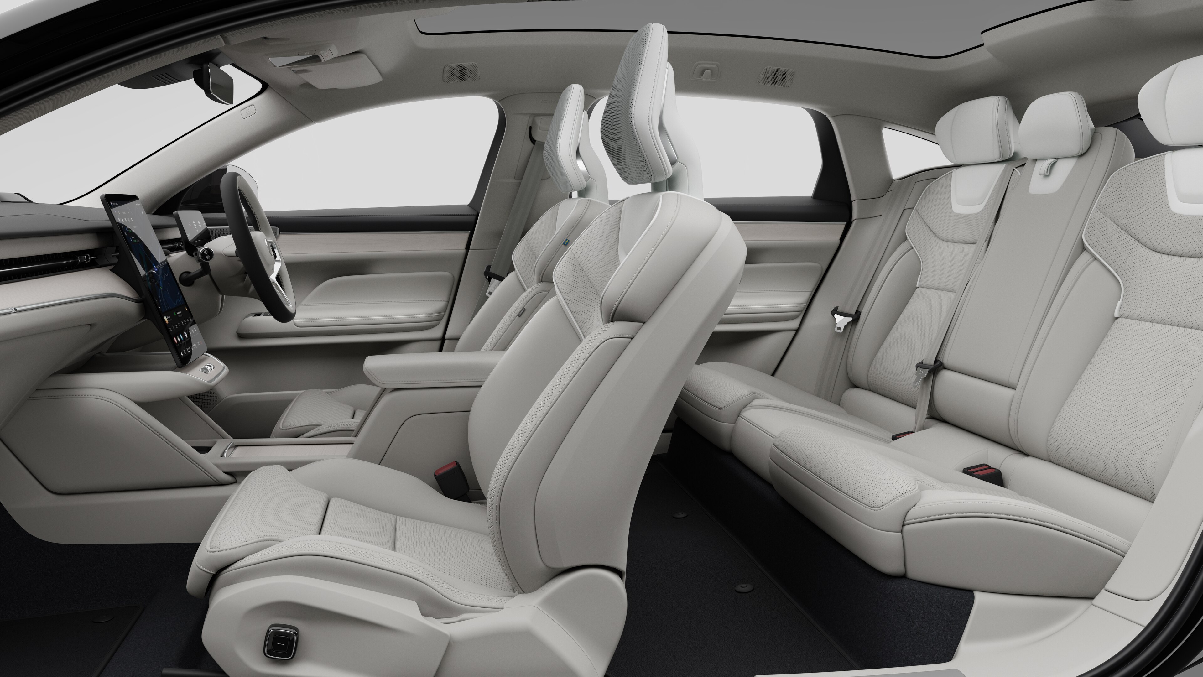 Volvo car interior side view showcasing front seats, rear passenger seats, steering wheel, dashboard, and center console, set against plain studio background.