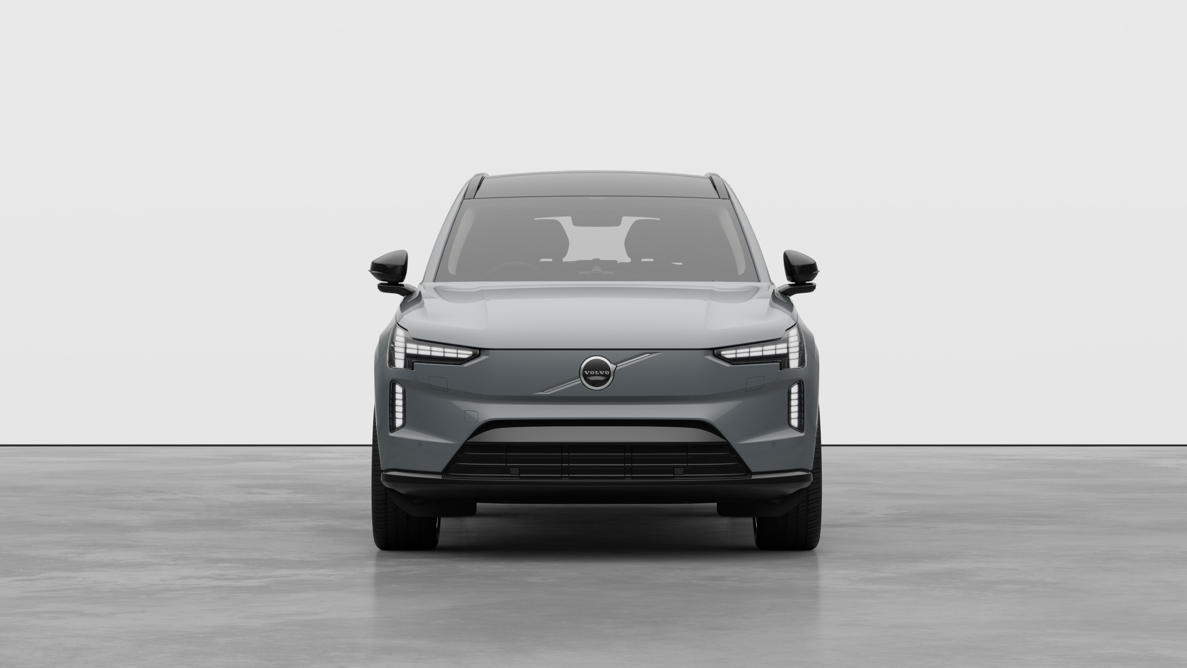 Front view of a Volvo car in a plain studio background.