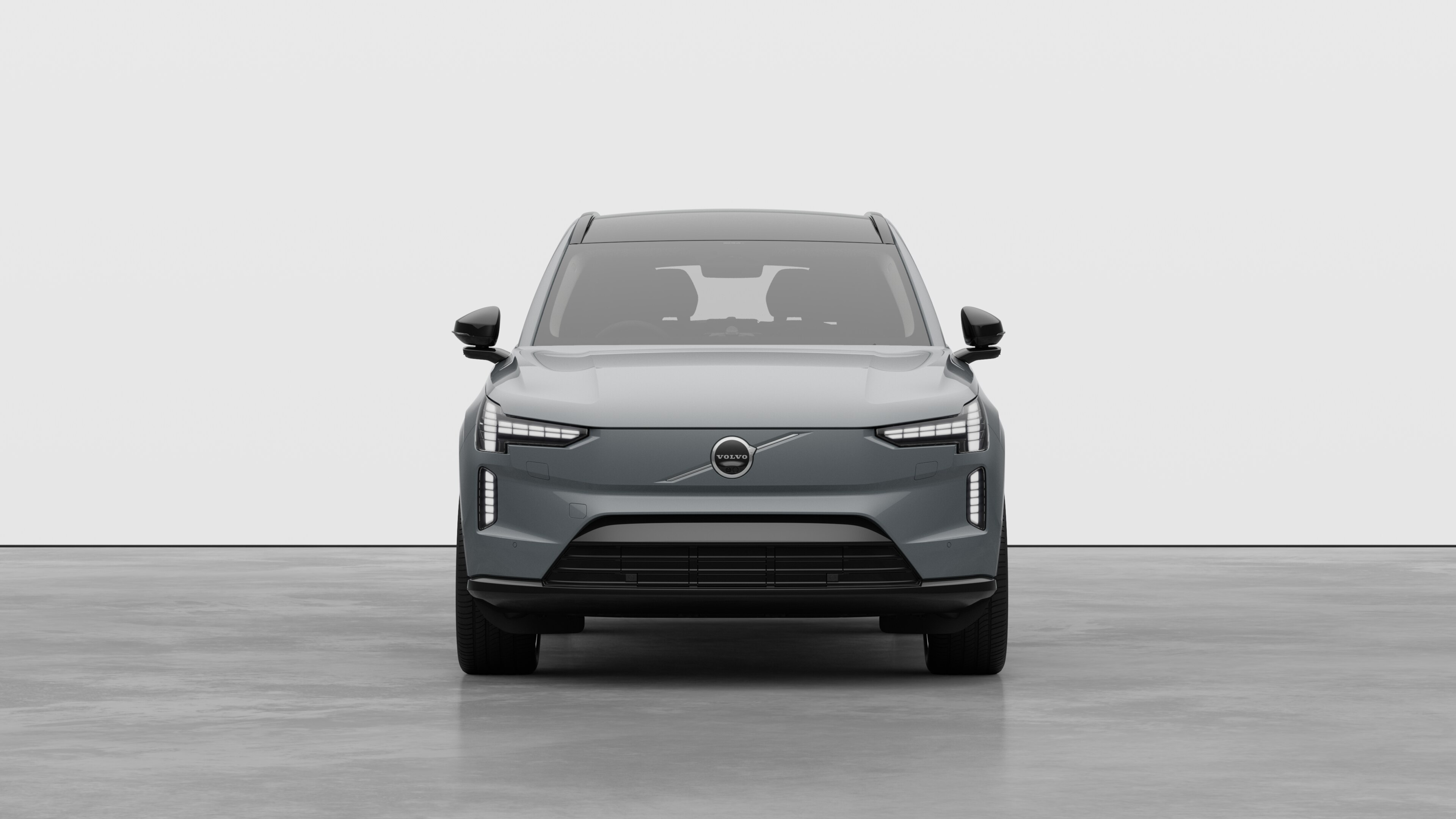 Front view of a Volvo car in a plain studio background.