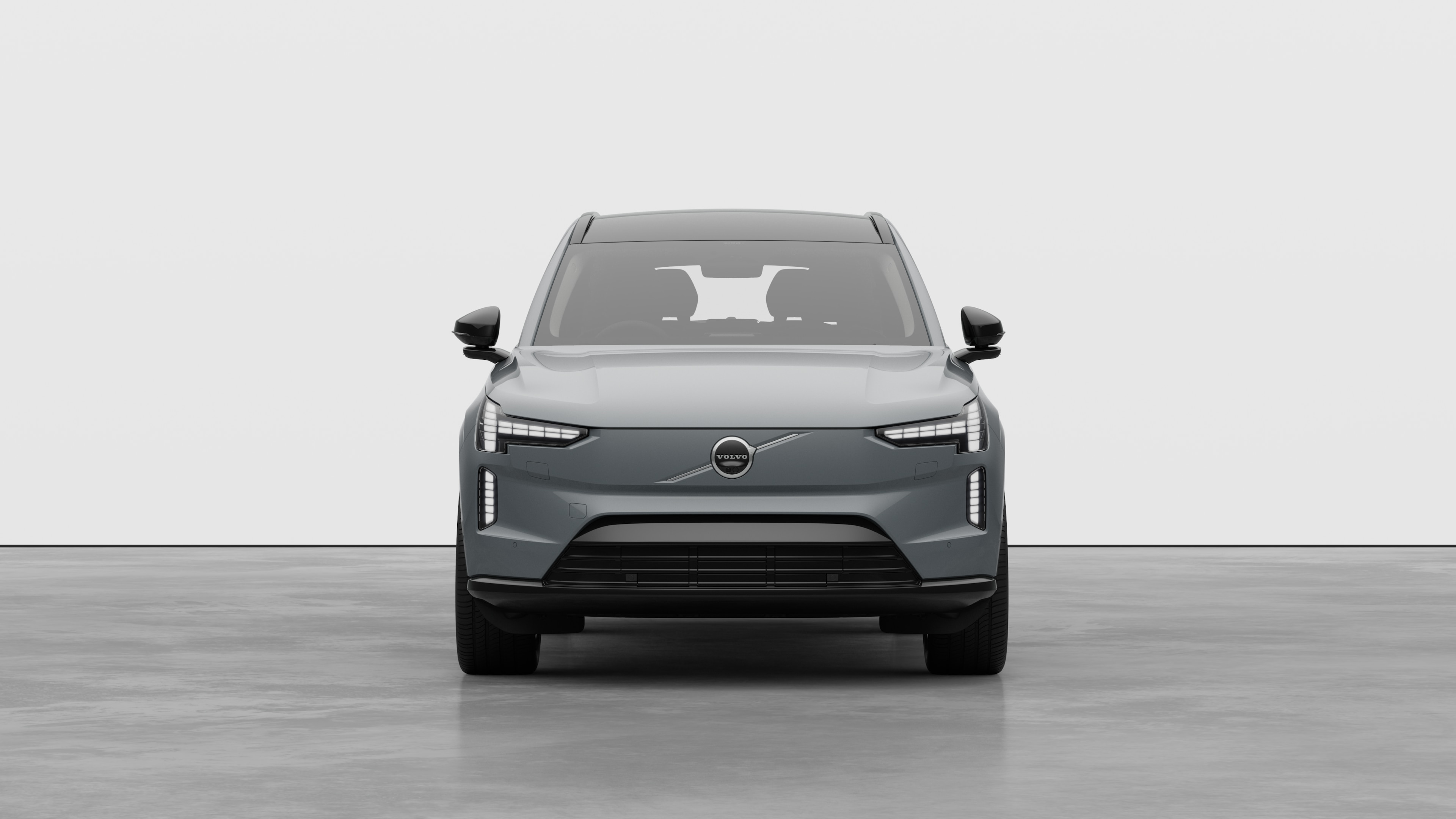 Front view of a Volvo car in a plain studio background.