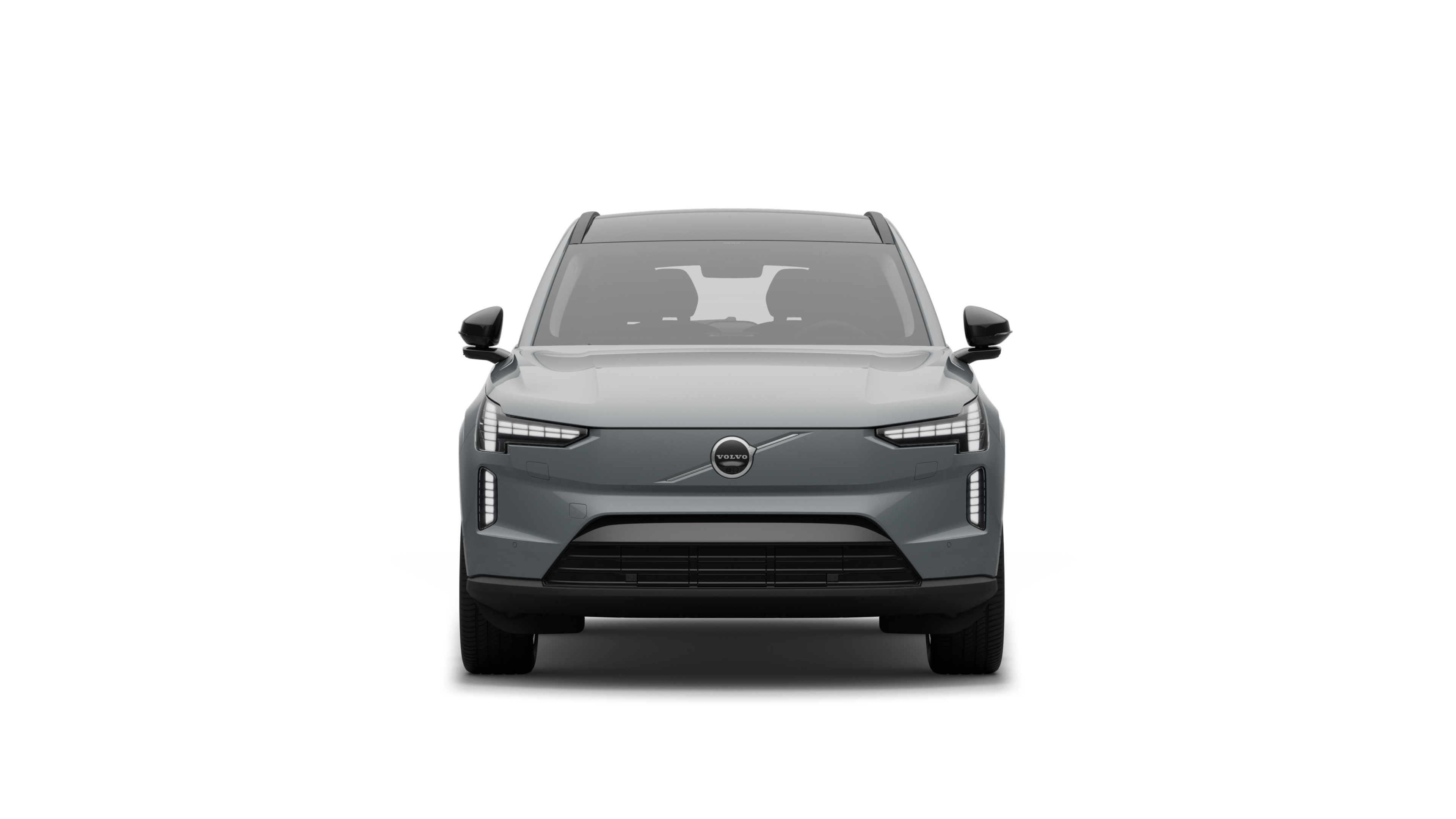 Widok samochodu Volvo z przodu na tle zwykłego studia