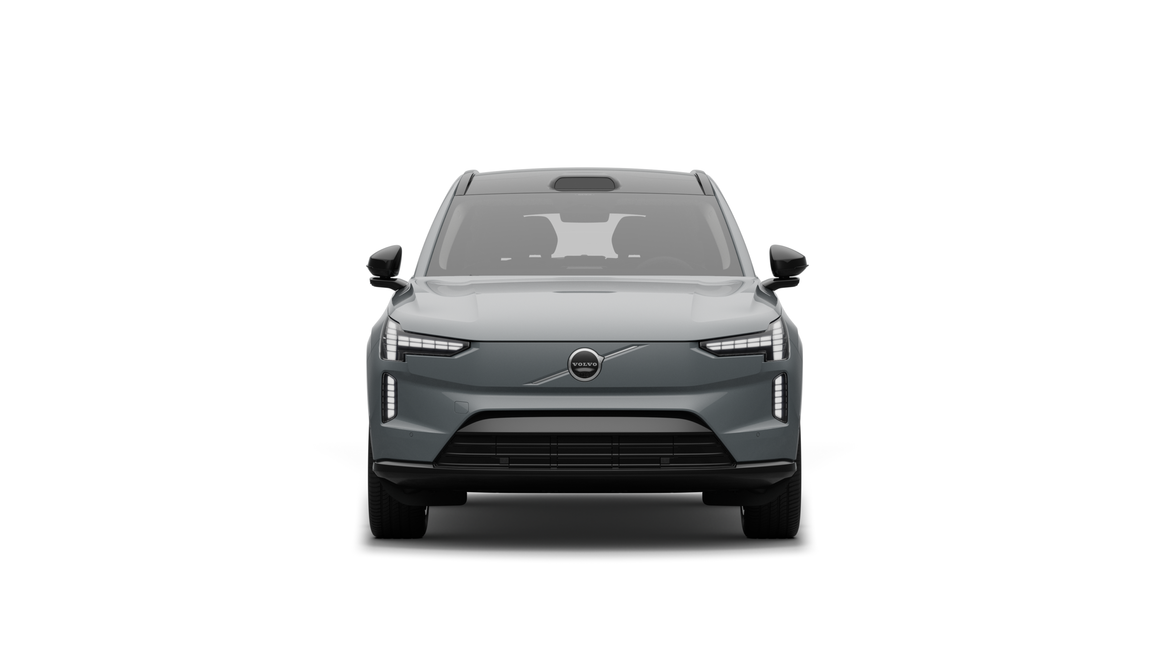 "Volvo" automobilio vaizdas iš priekio paprastame studijos fone.