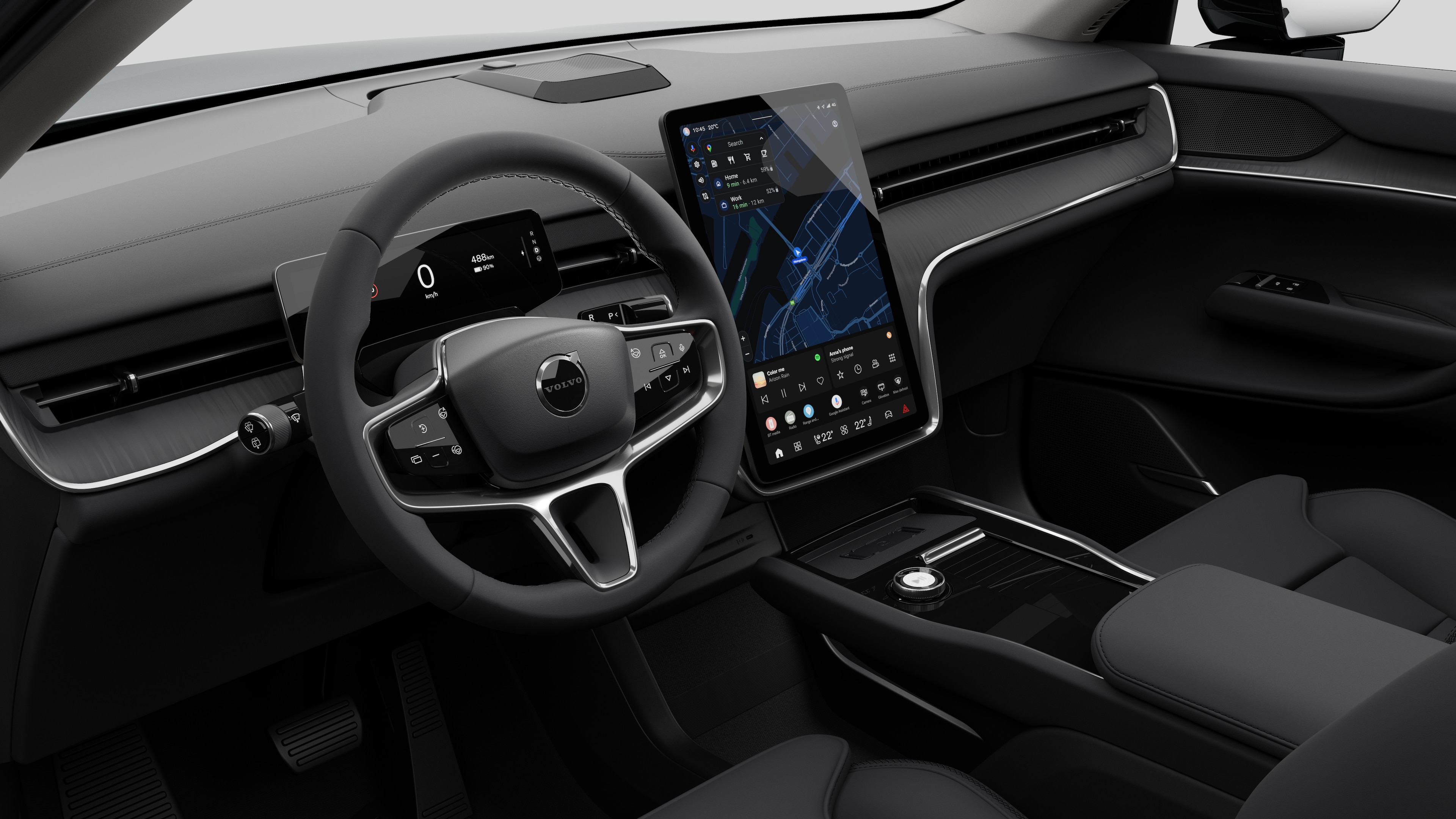 Vista interior de un coche Volvo en la que se muestran el salpicadero, el volante, la consola central y la pantalla digital con un fondo de estudio liso.
