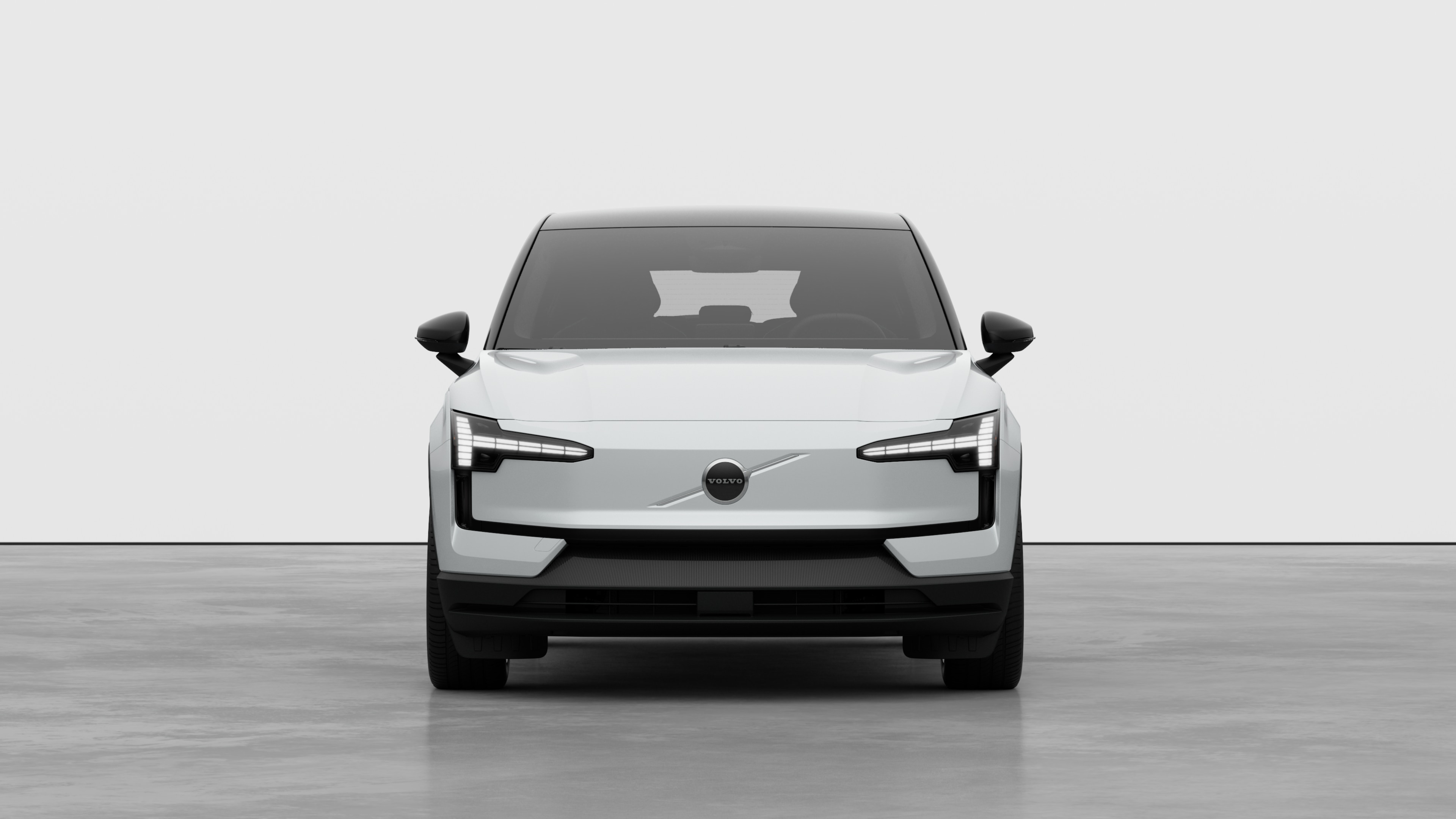 Front view of a Volvo car in a plain studio background.