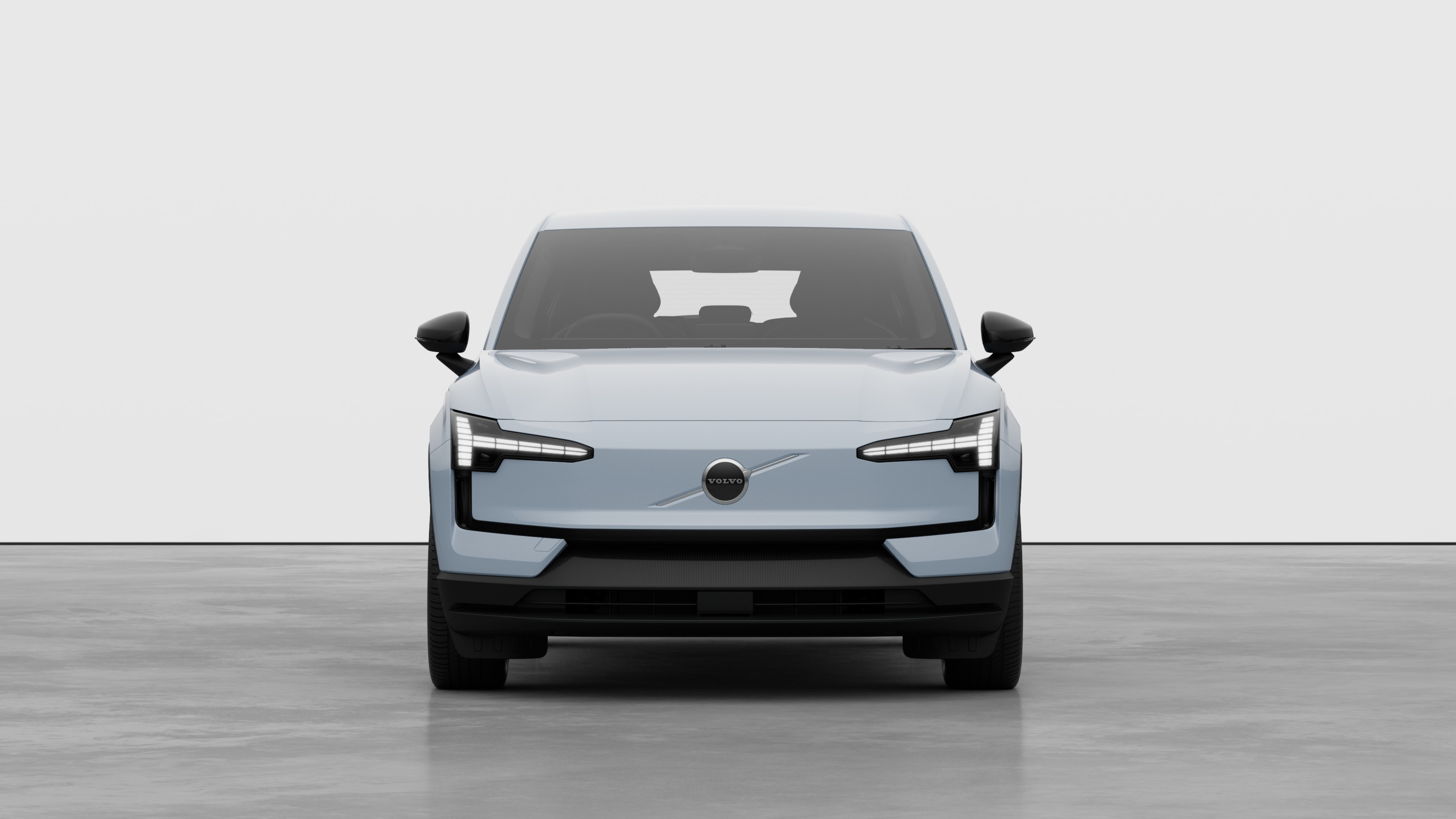 Front view of a Volvo car in a plain studio background.