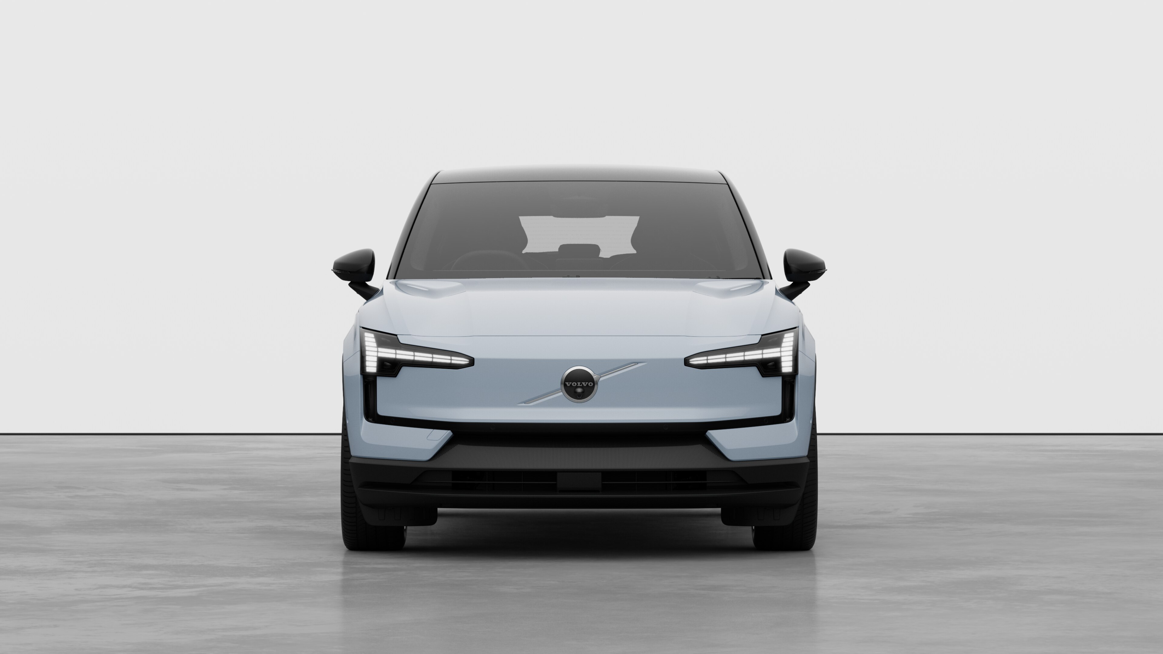 Front view of a Volvo car in a plain studio background.