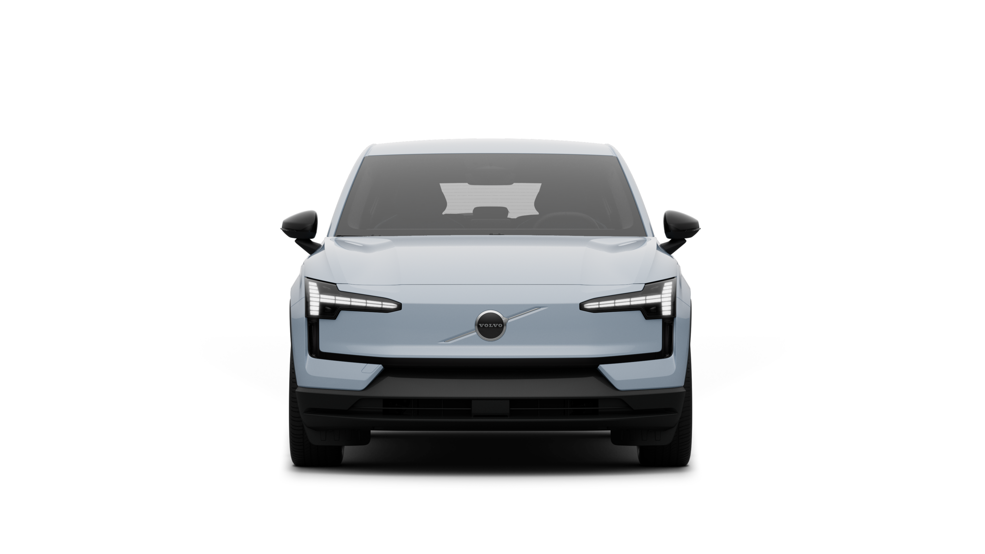 Framhlið Volvo-bíls í látlausum stúdíóbakgrunni.