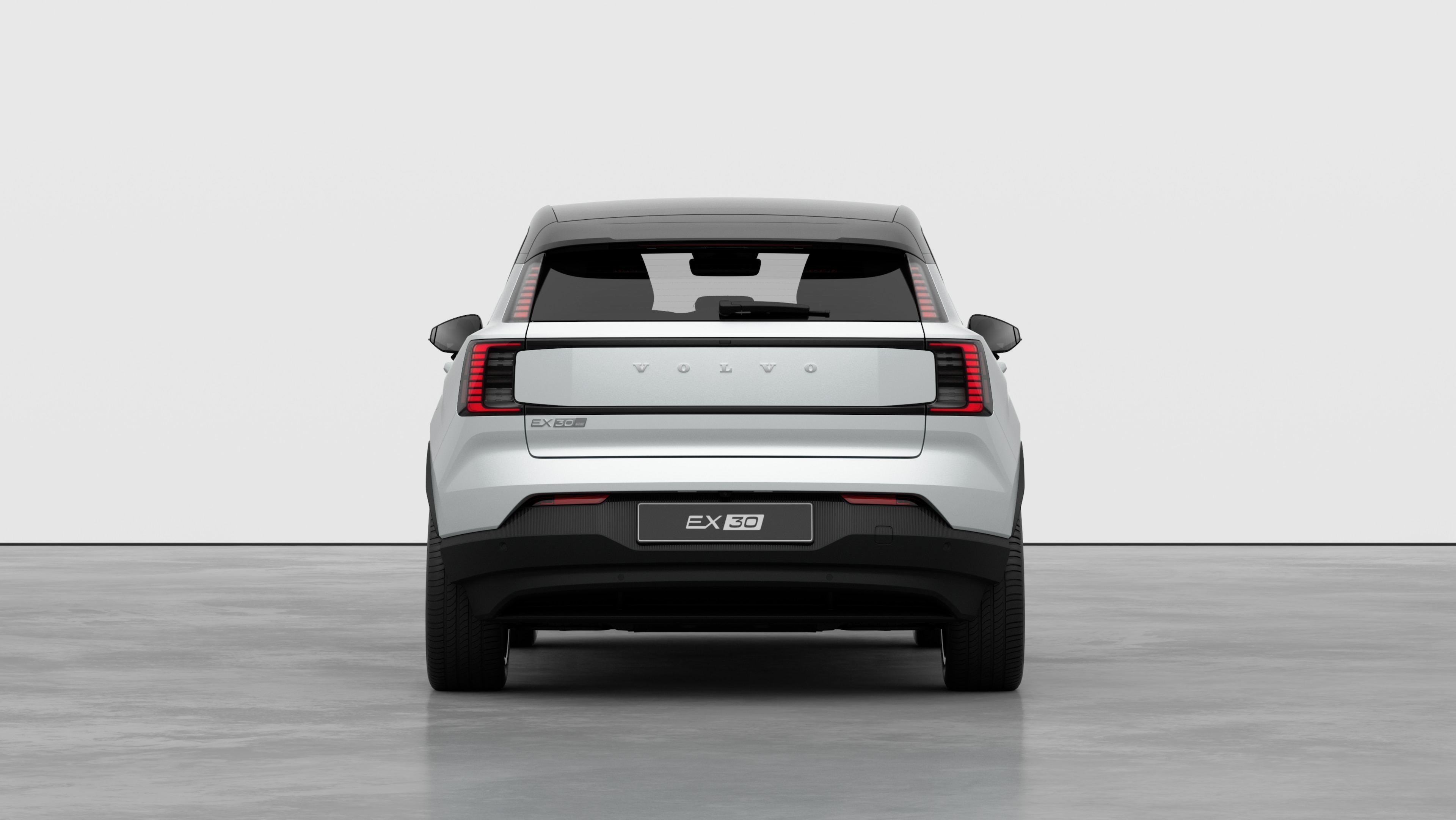 Volvo car rear view against a plain studio background.