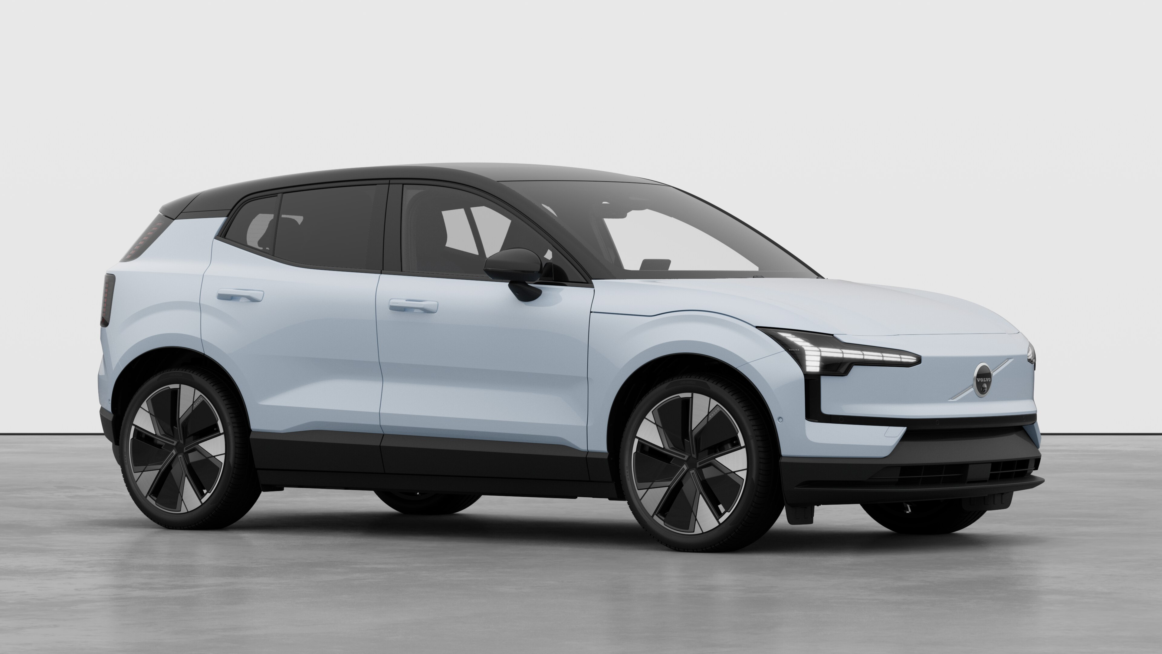 Volvo car exterior, three-quarter view in a plain studio background.