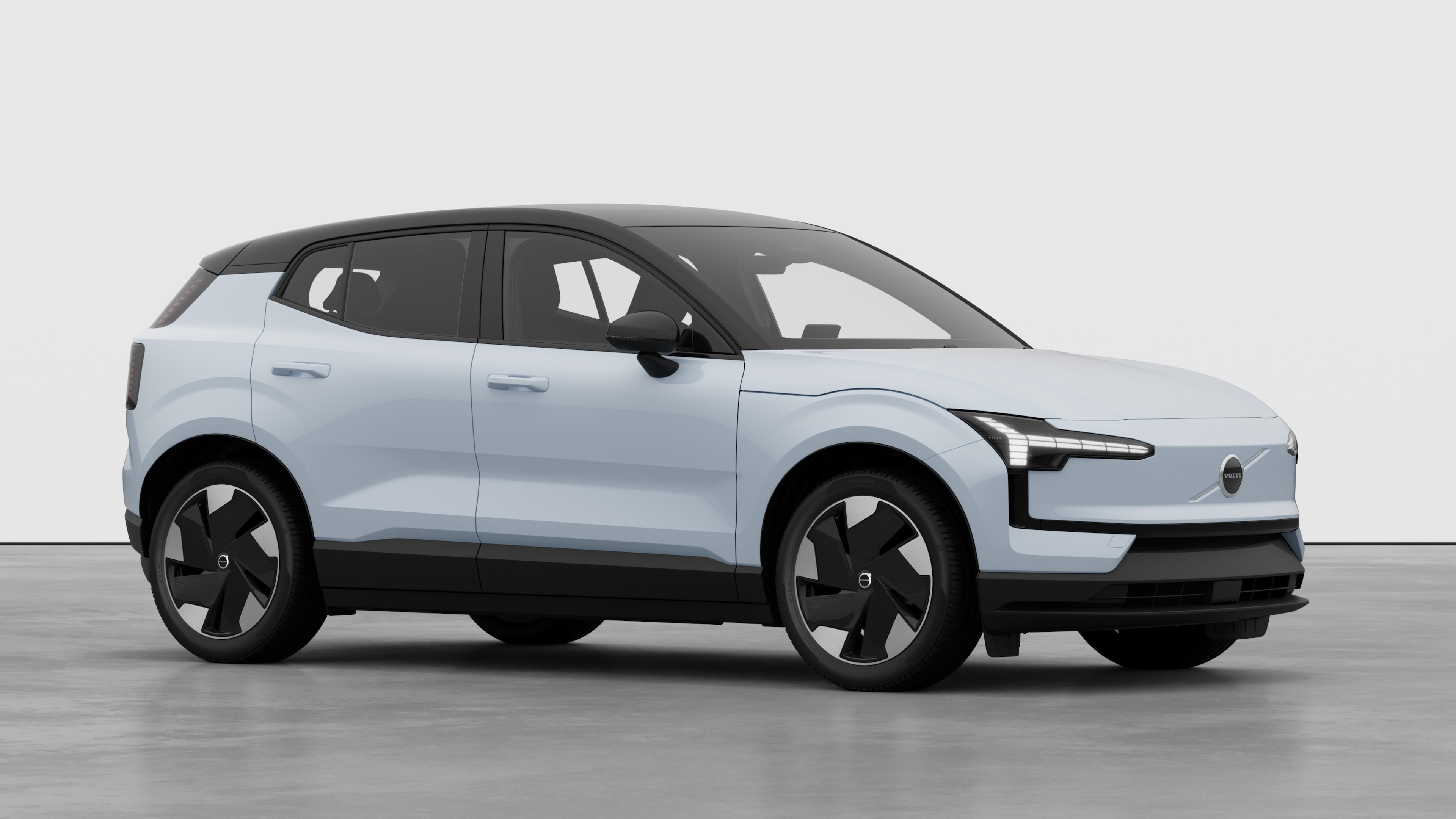 Volvo car exterior, three-quarter view in a plain studio background.