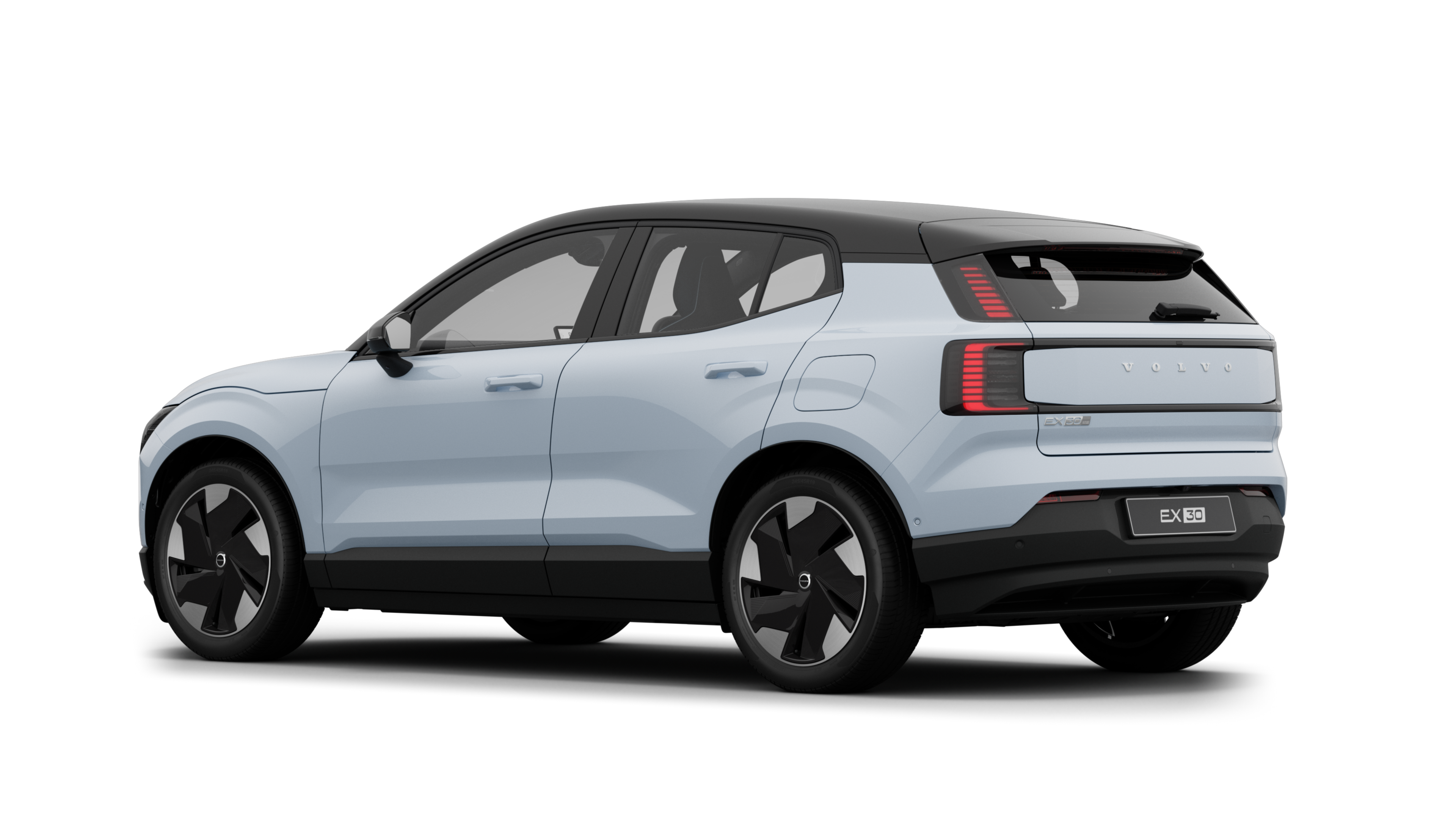 Volvo car rear three-quarter view in a plain studio background.