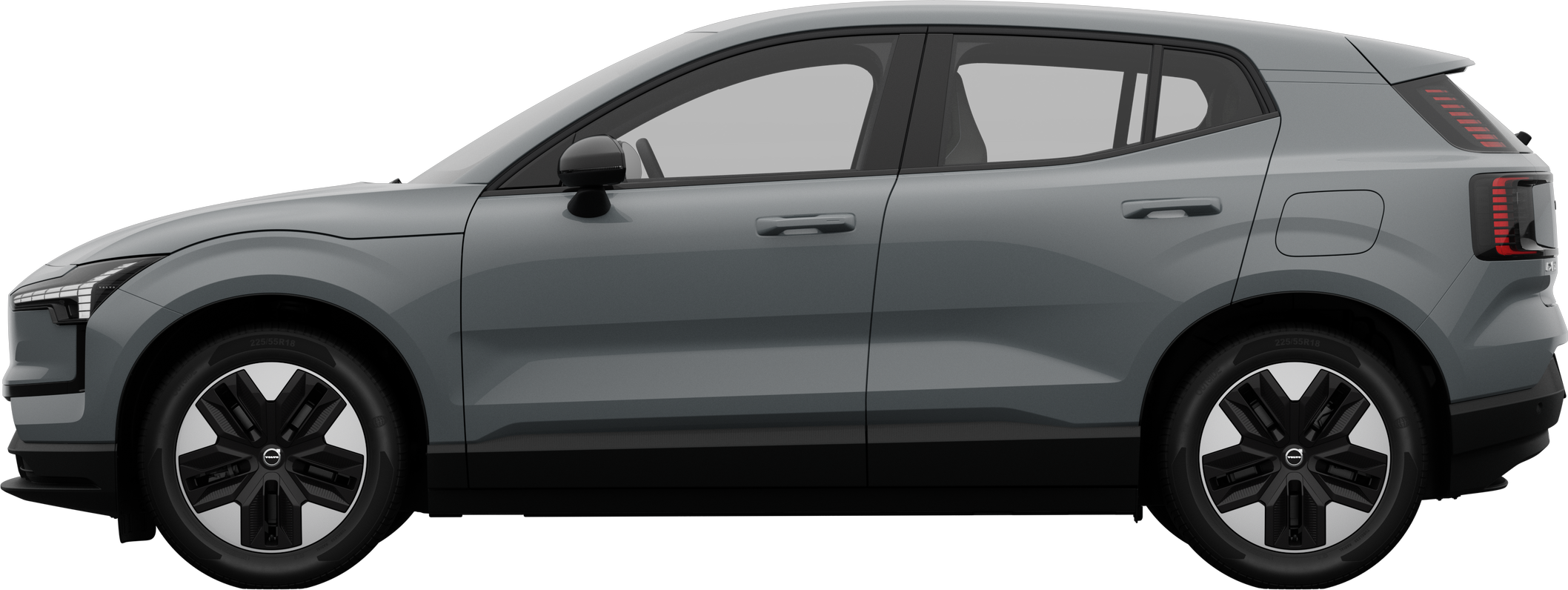 Vue latérale d’une Volvo garée sur un fond de studio uni, mettant en valeur le profil et le design épurés du véhicule.