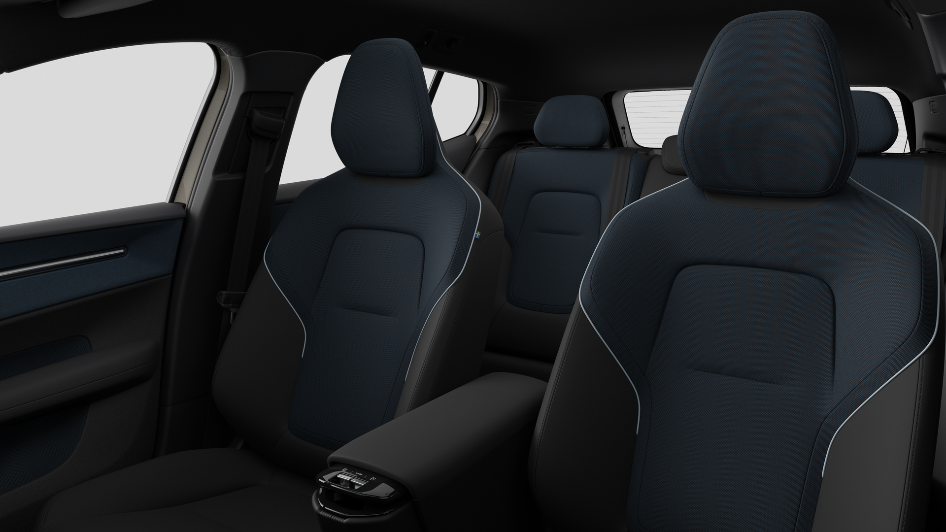 Volvo car interior showing rear passenger seats and center console in plain studio background.