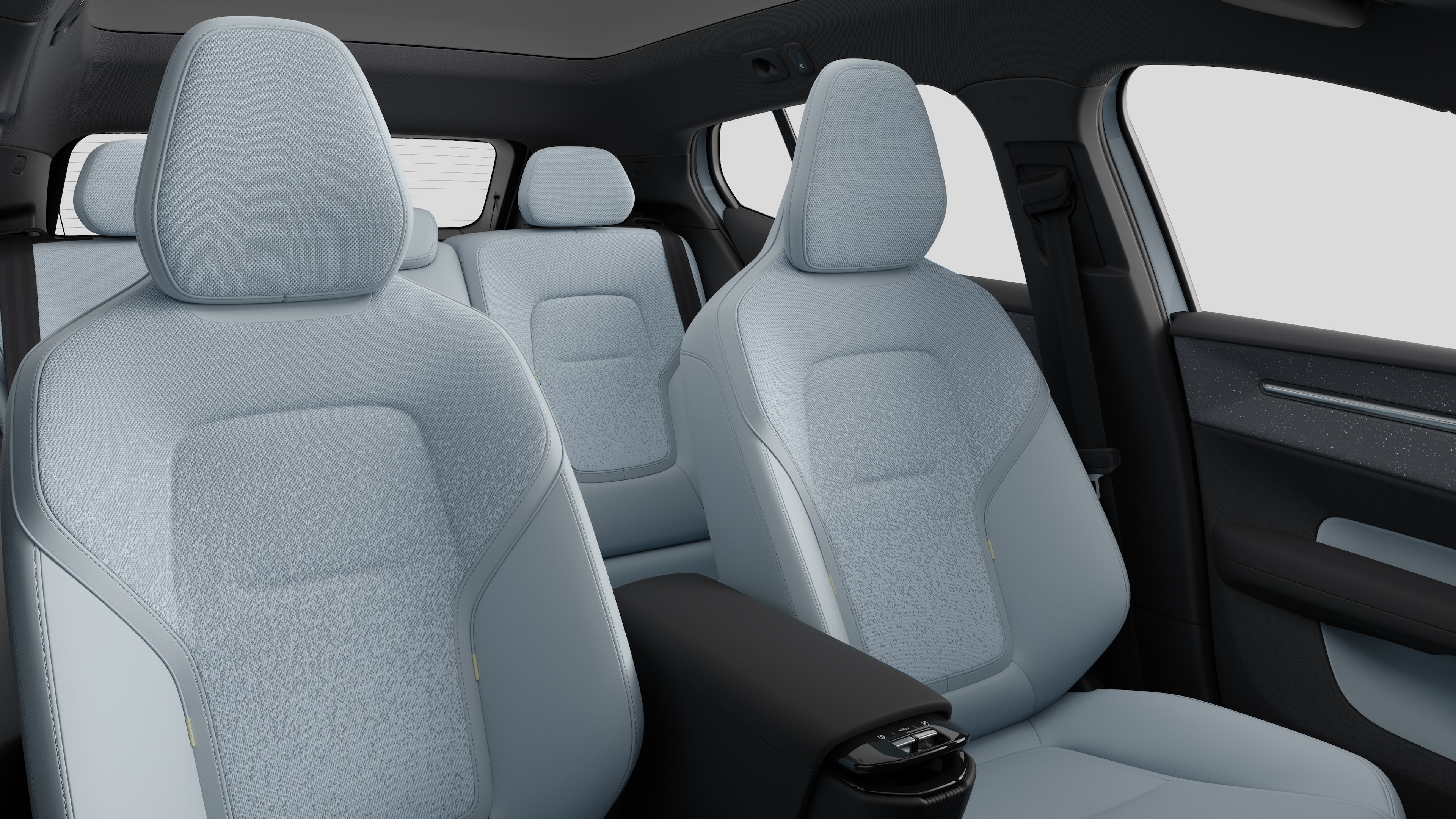 Volvo car interior showing rear passenger seats and center console in plain studio background.