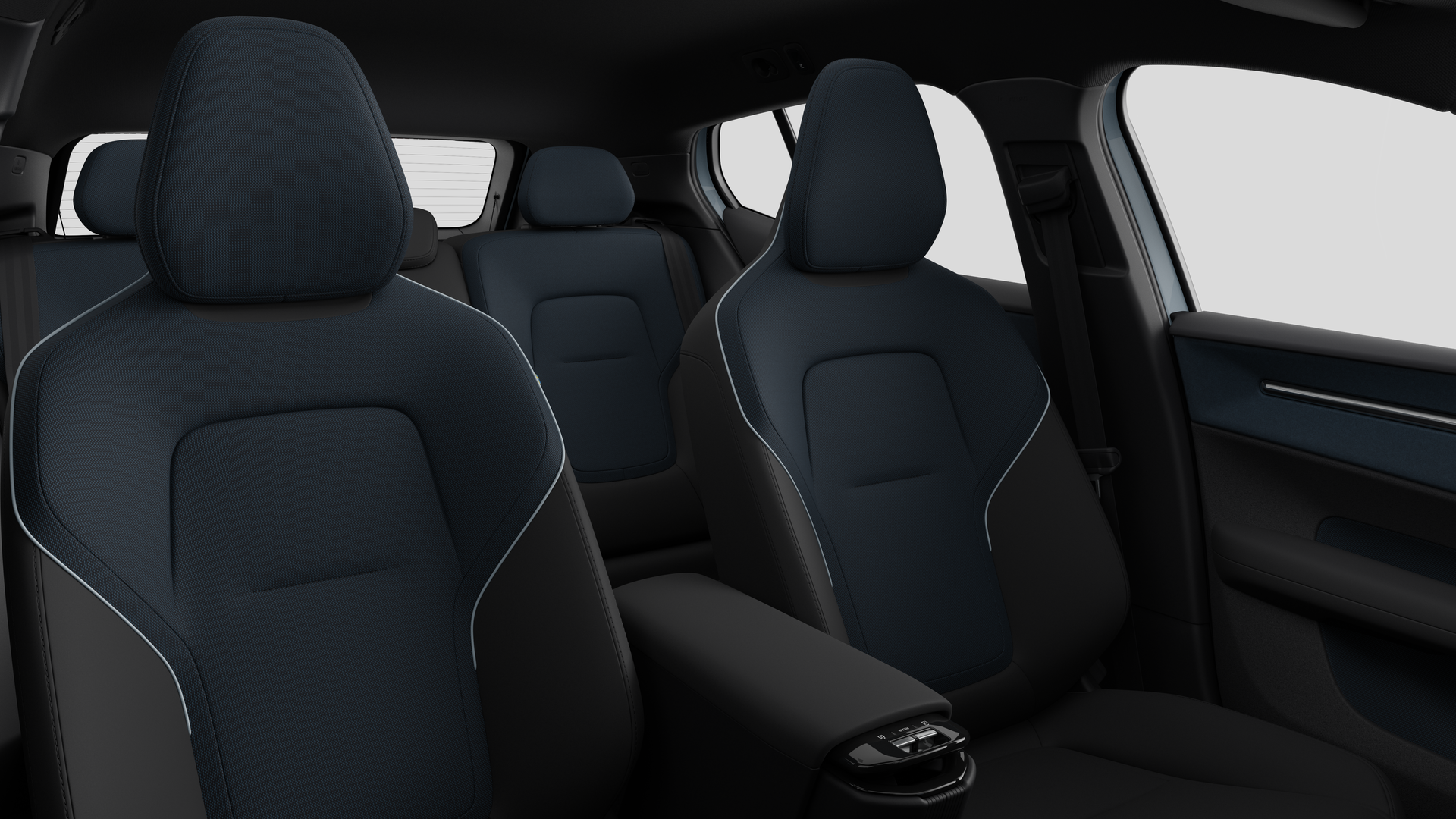 Volvo car interior showing rear passenger seats and center console in plain studio background.