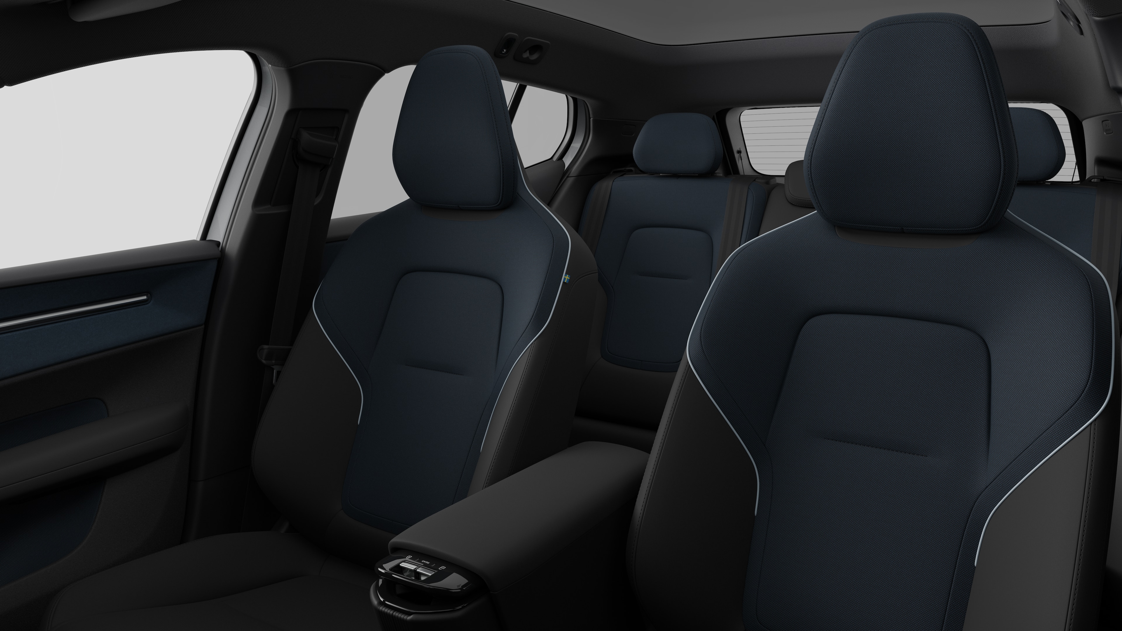 Volvo car interior showing rear passenger seats and center console in plain studio background.