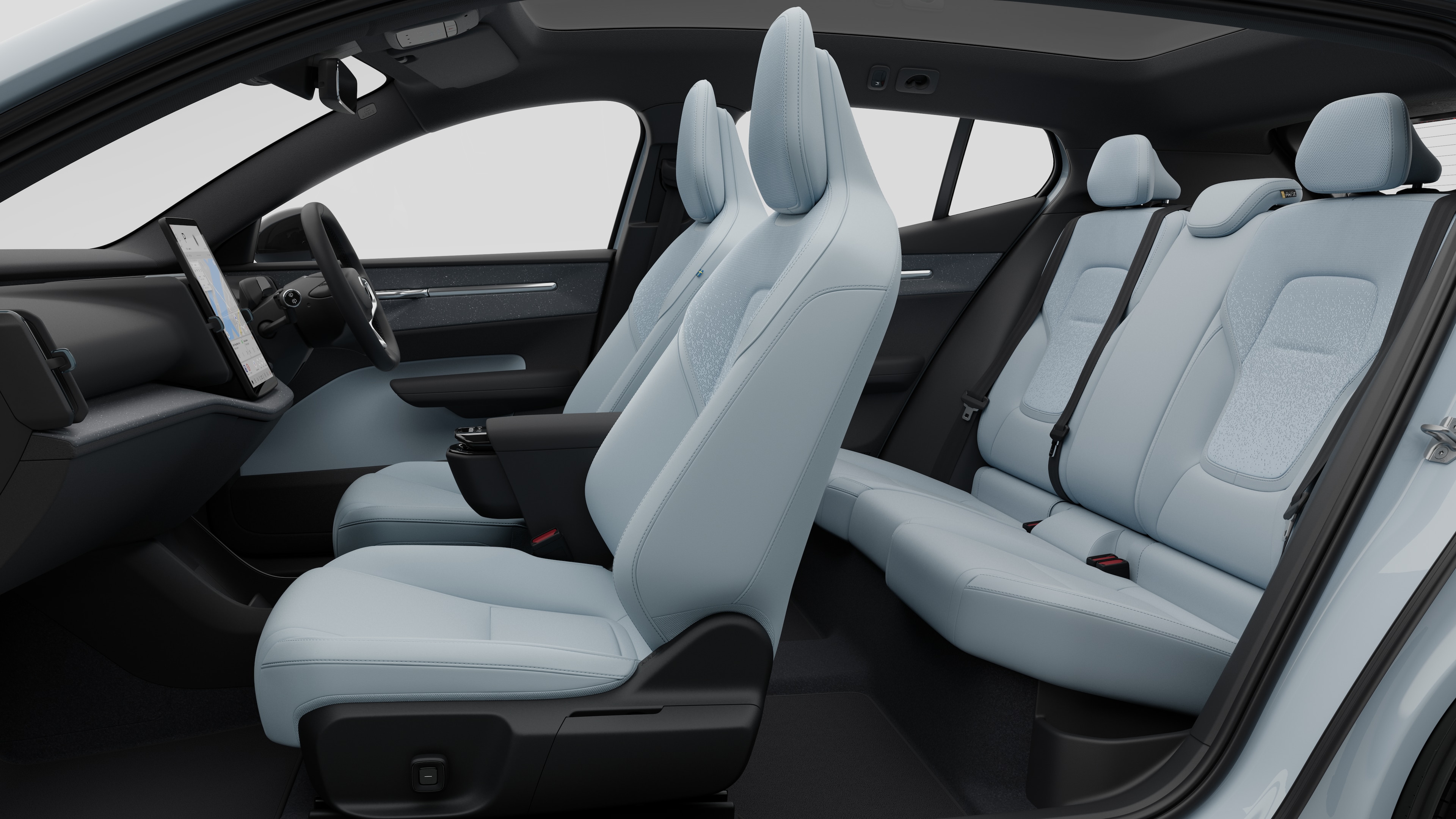 Volvo car interior side view showcasing front seats, rear passenger seats, steering wheel, dashboard, and center console, set against plain studio background.