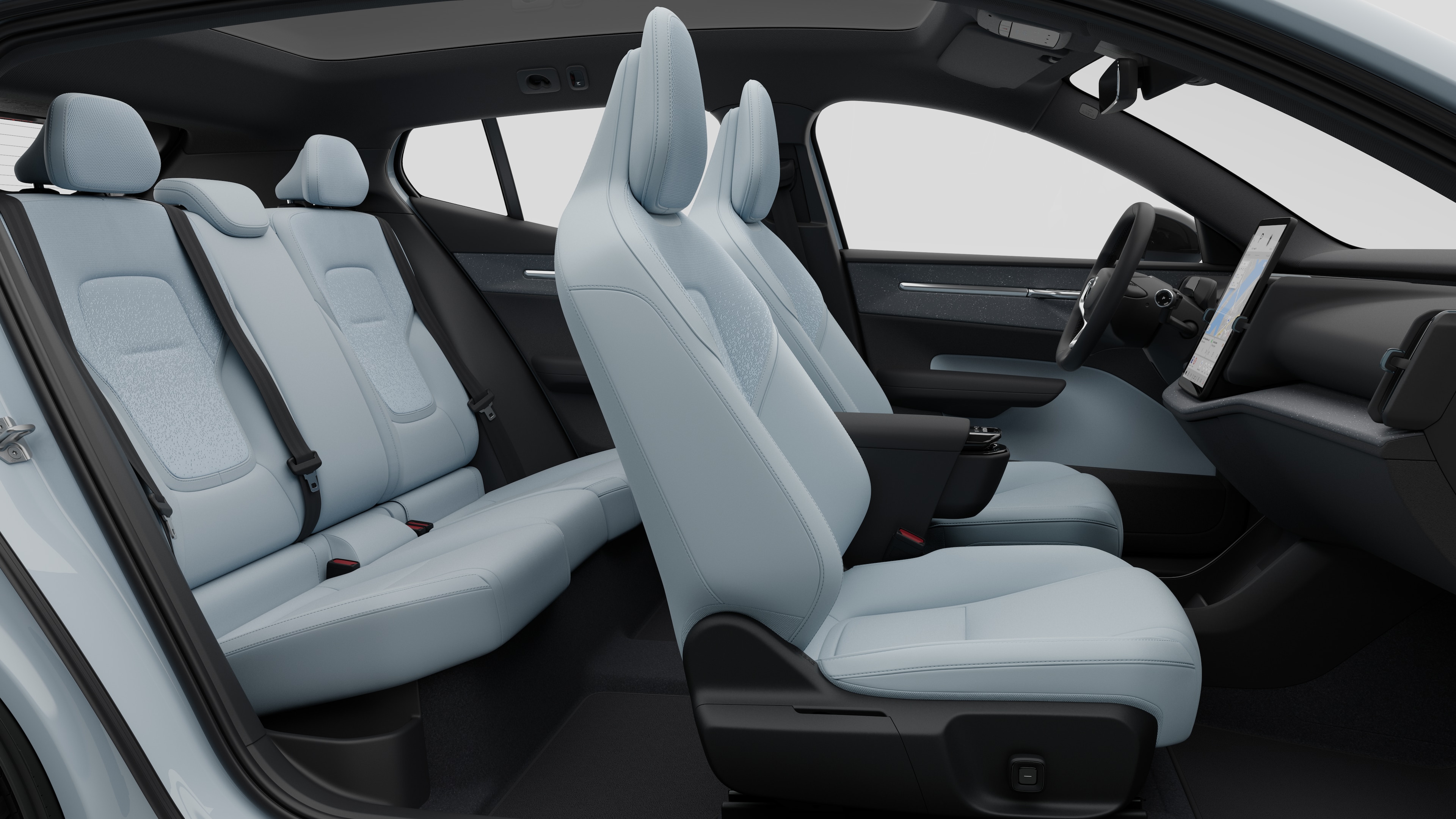 Volvo -auton sisätilojen sivunäkymä, jossa näkyy etuistuimet, takamatkustajan istuimet, ohjauspyörä, kojelauta ja keskikonsoli studiotaustaa vasten.