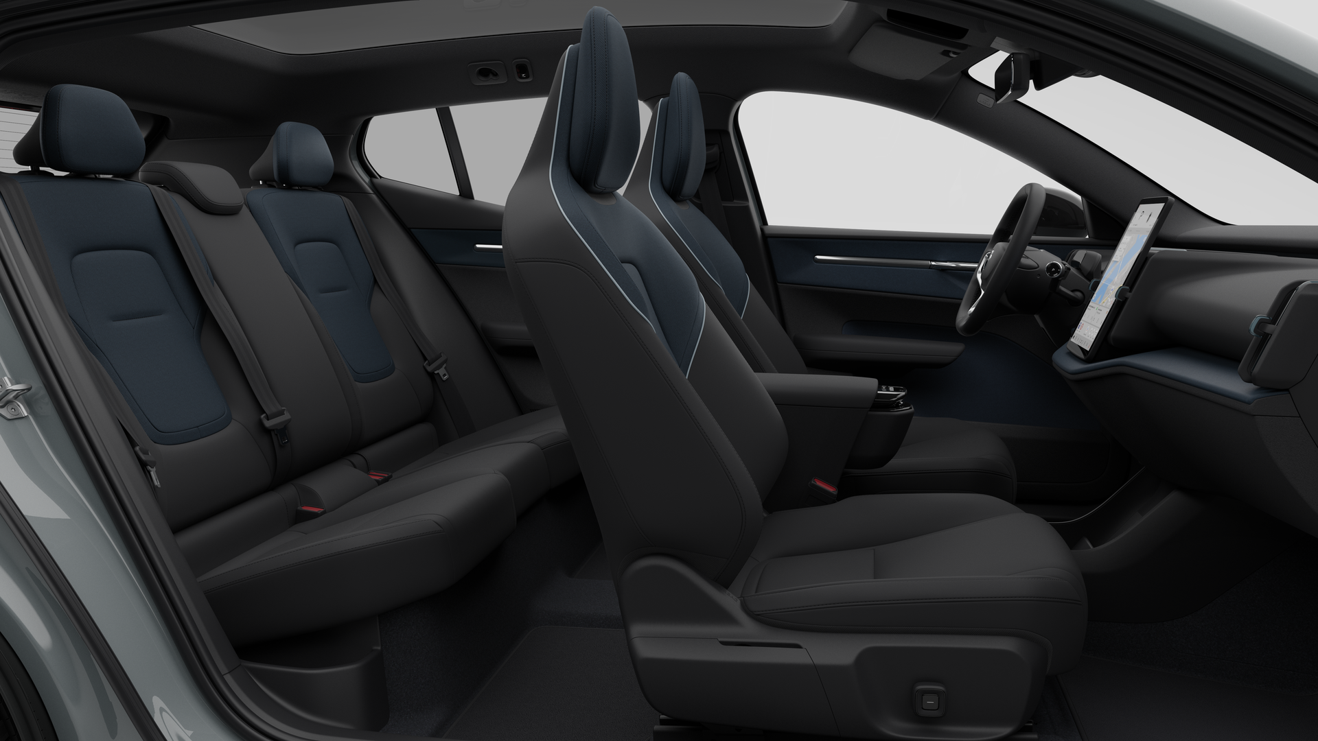 Vue latérale de l’intérieur d’une Volvo montrant les sièges avant, les sièges passager arrière, le volant, le tableau de bord et la console centrale, sur fond de studio.