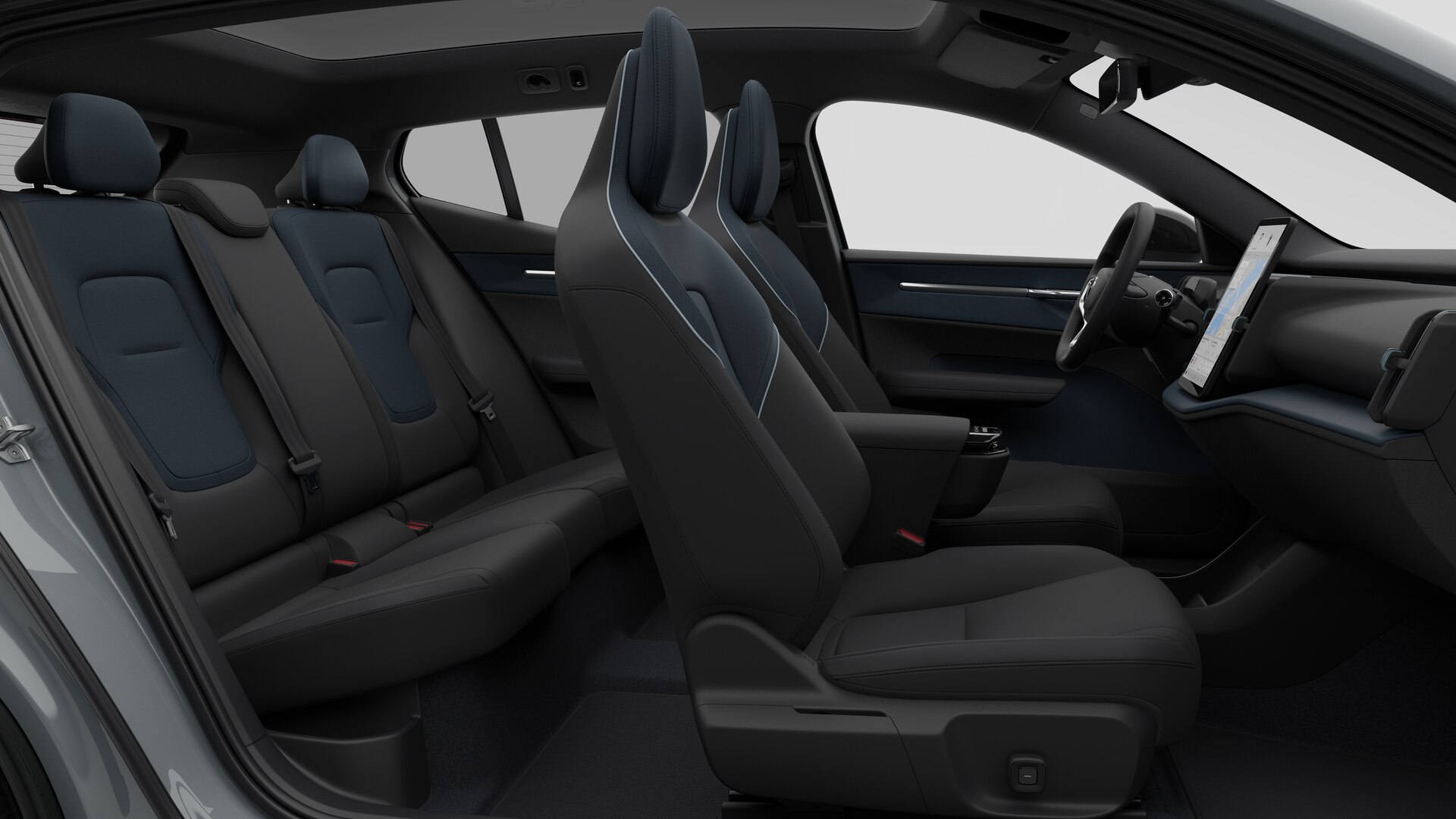Vue latérale de l’intérieur d’une Volvo montrant les sièges avant, les sièges passager arrière, le volant, le tableau de bord et la console centrale, sur fond de studio.