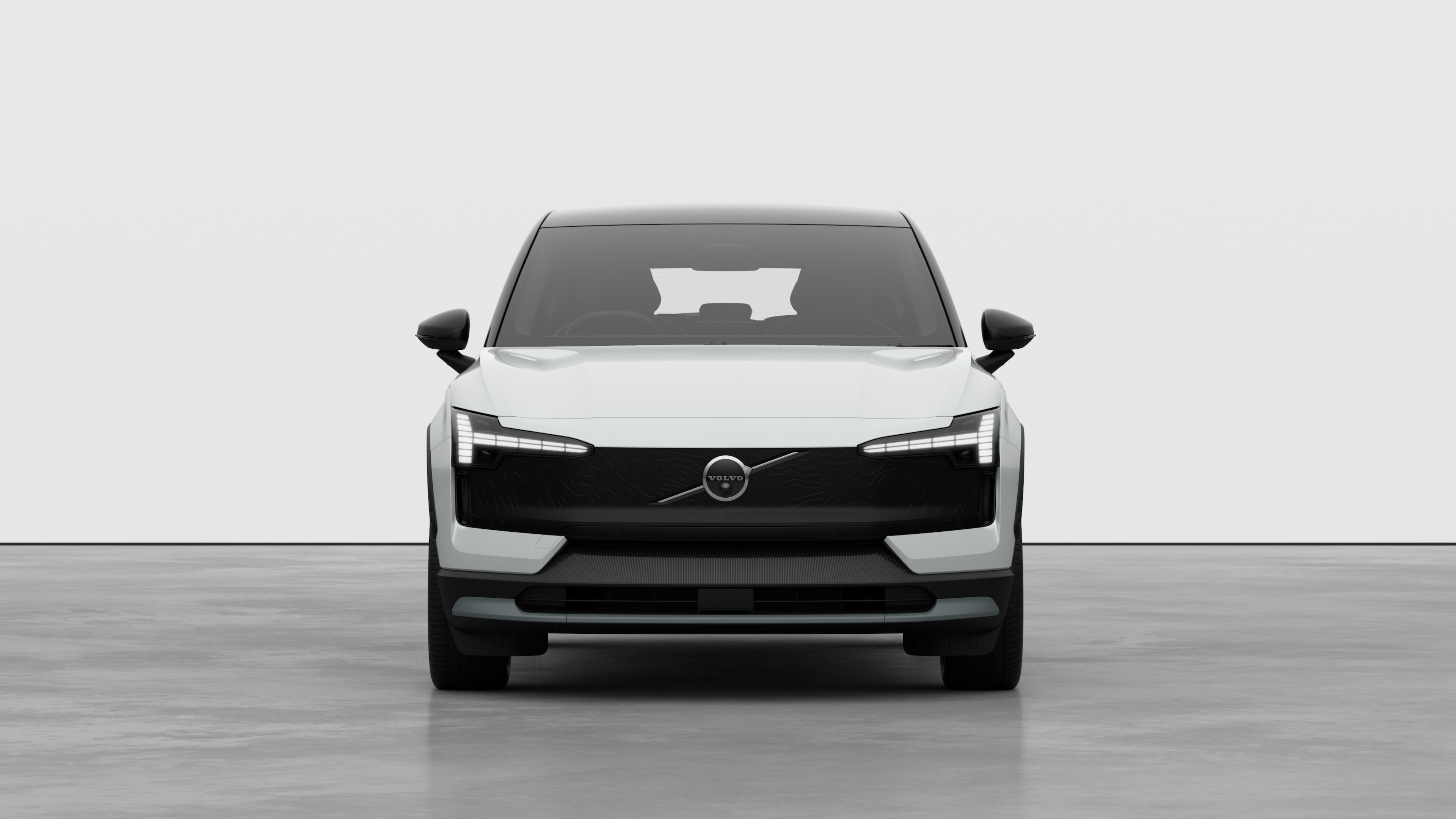 Front view of a Volvo car in a plain studio background.
