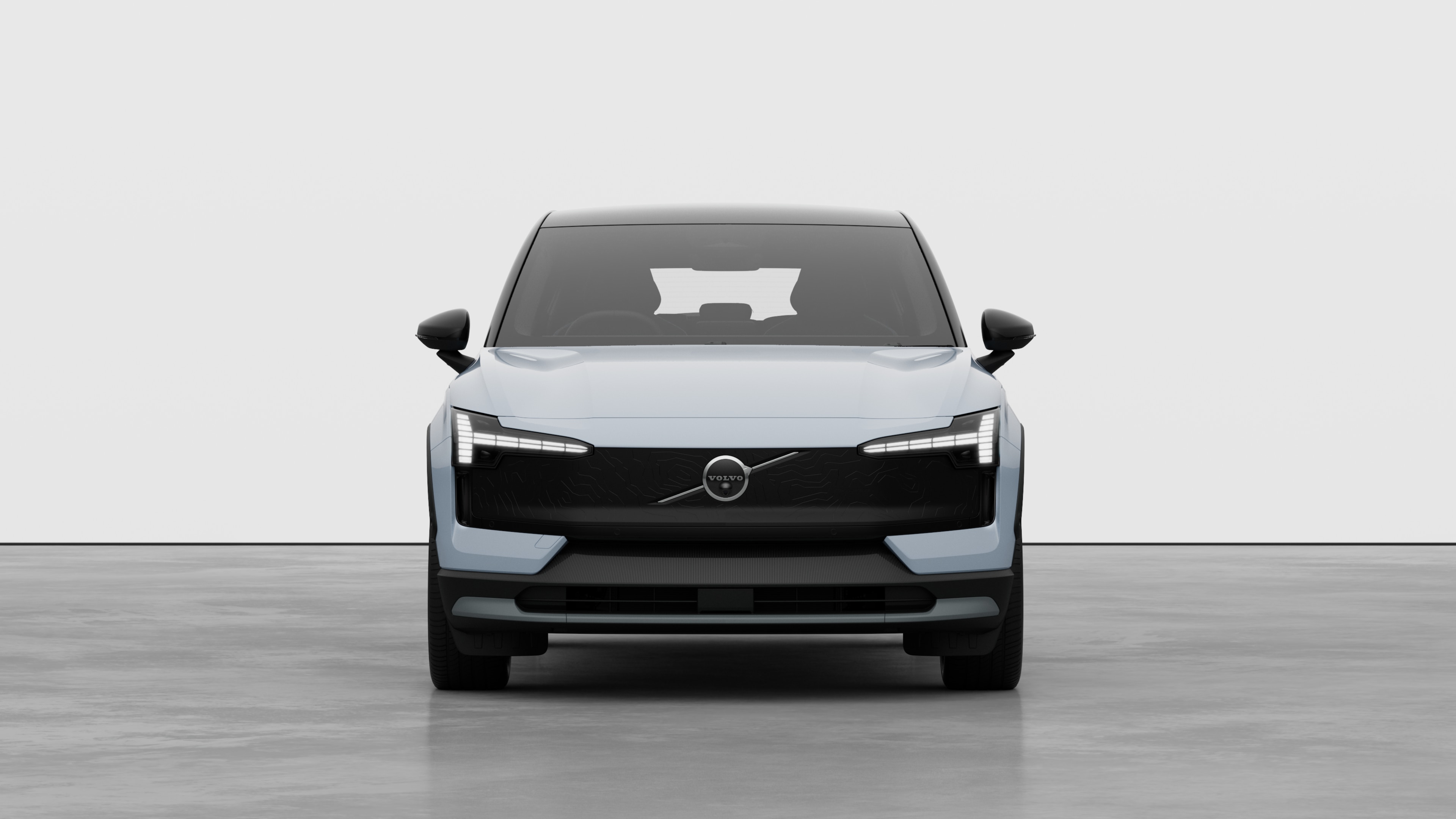 Front view of a Volvo car in a plain studio background.