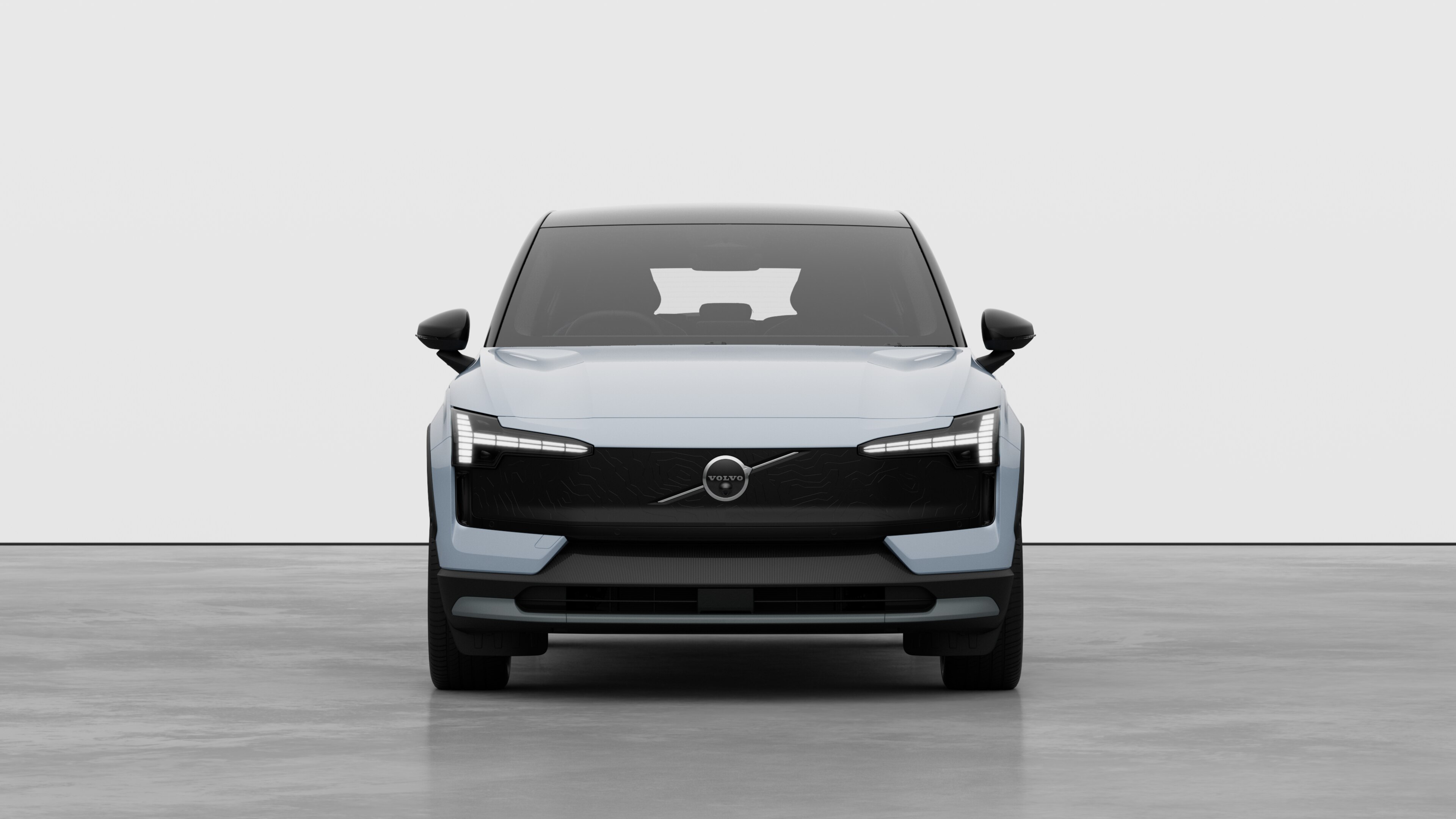 Front view of a Volvo car in a plain studio background.