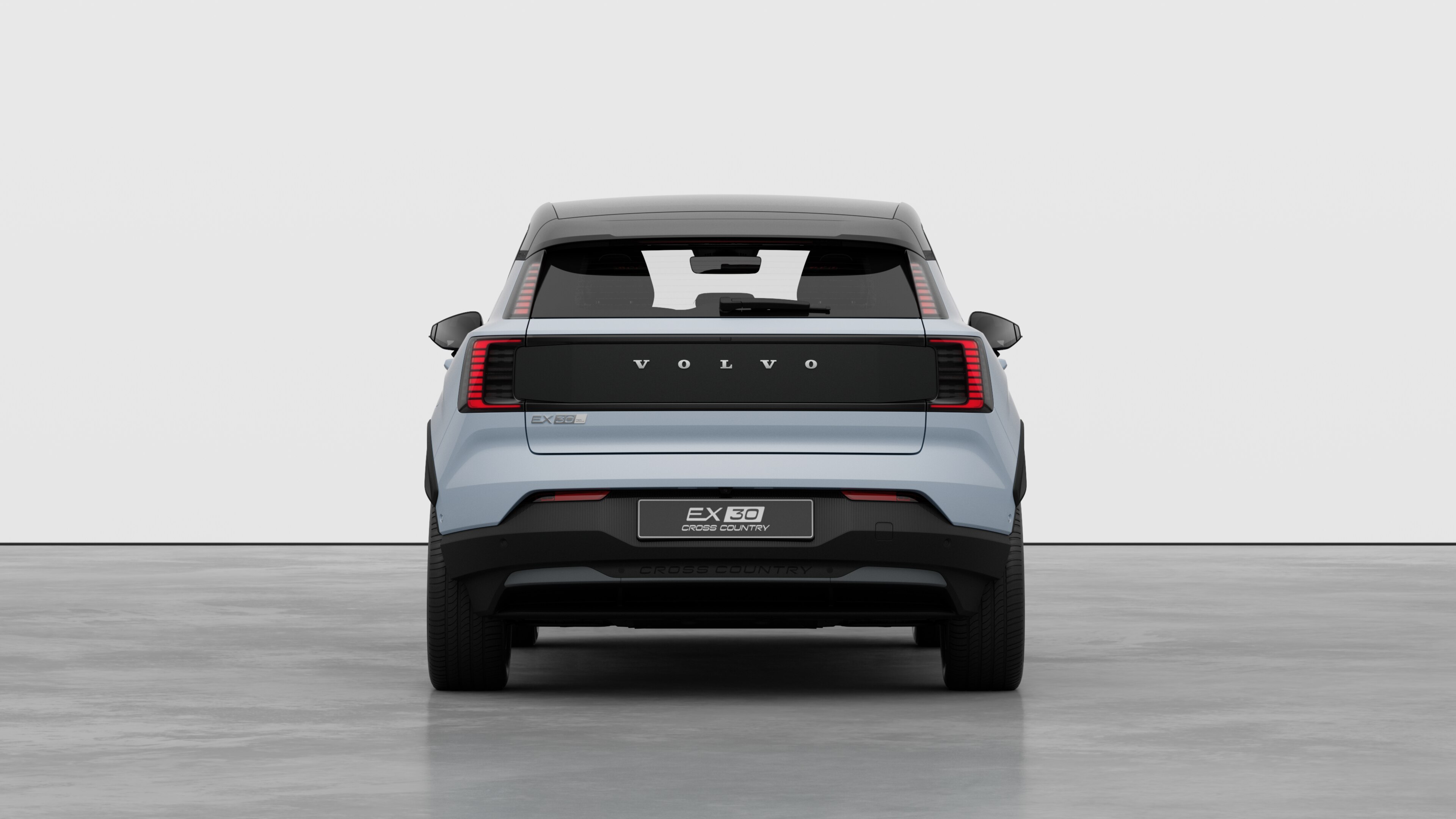 Vedere din spate a mașinii Volvo pe un fundal simplu de studio.