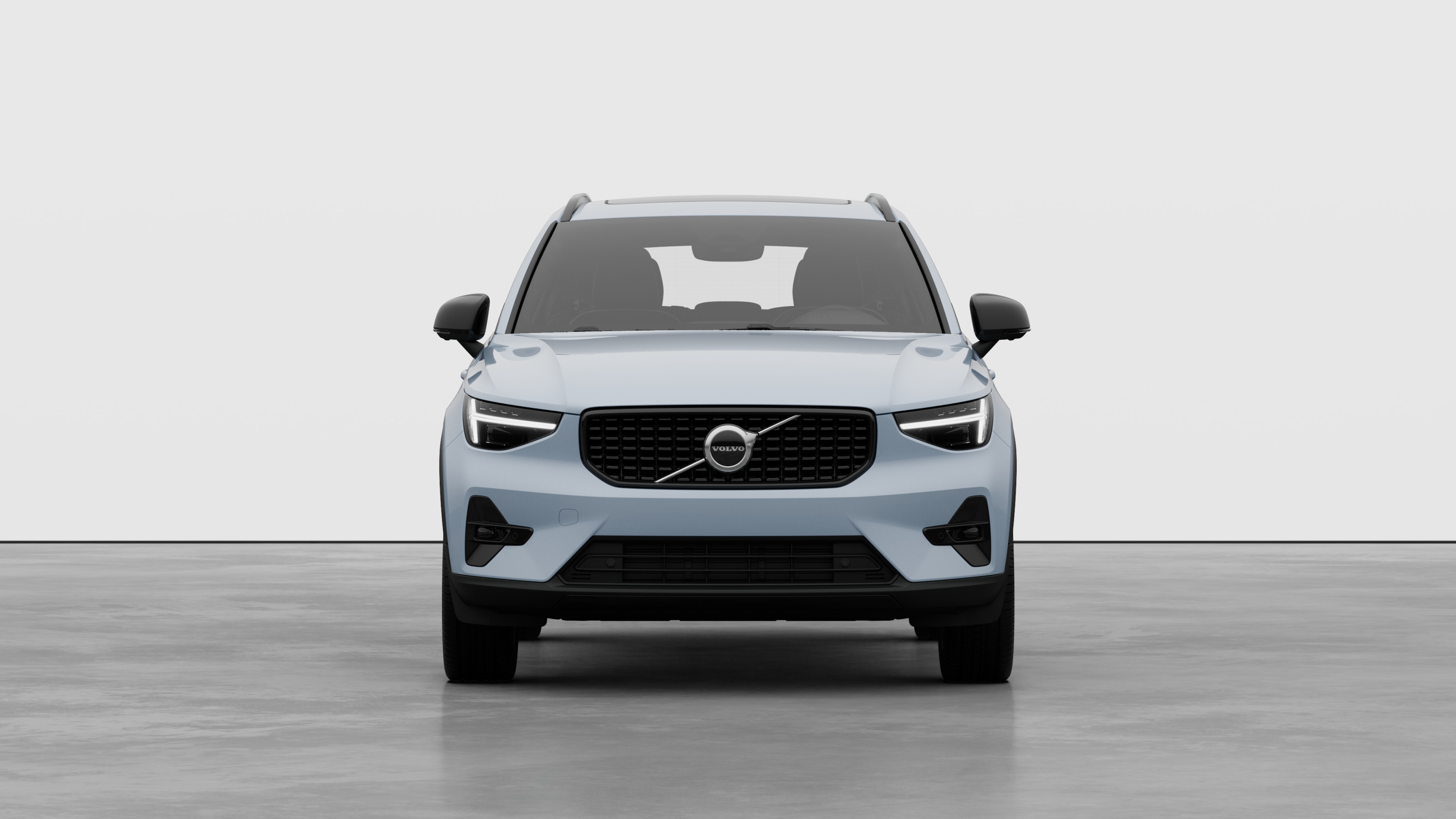 Front view of a Volvo car in a plain studio background.