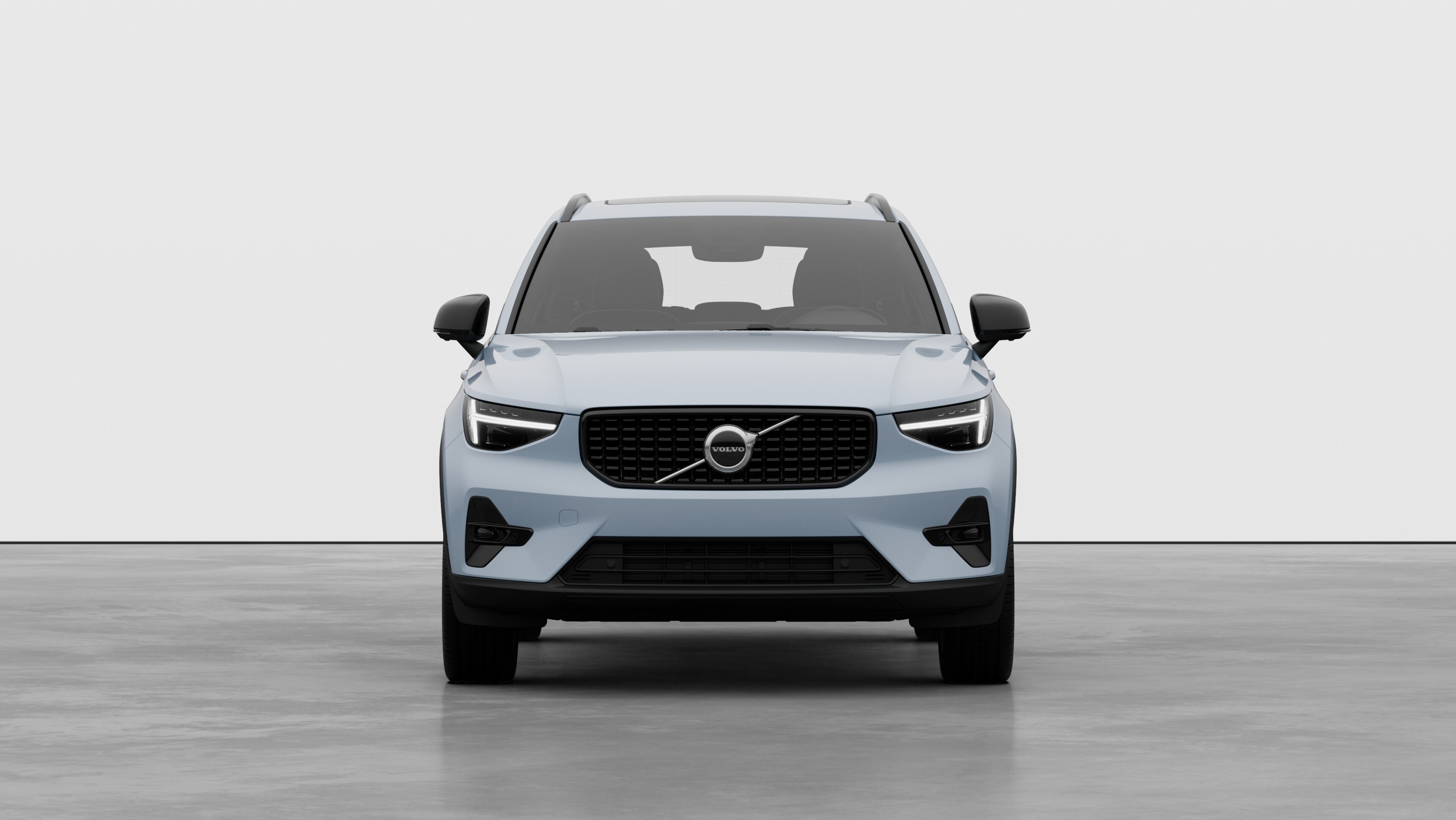 Front view of a Volvo car in a plain studio background.