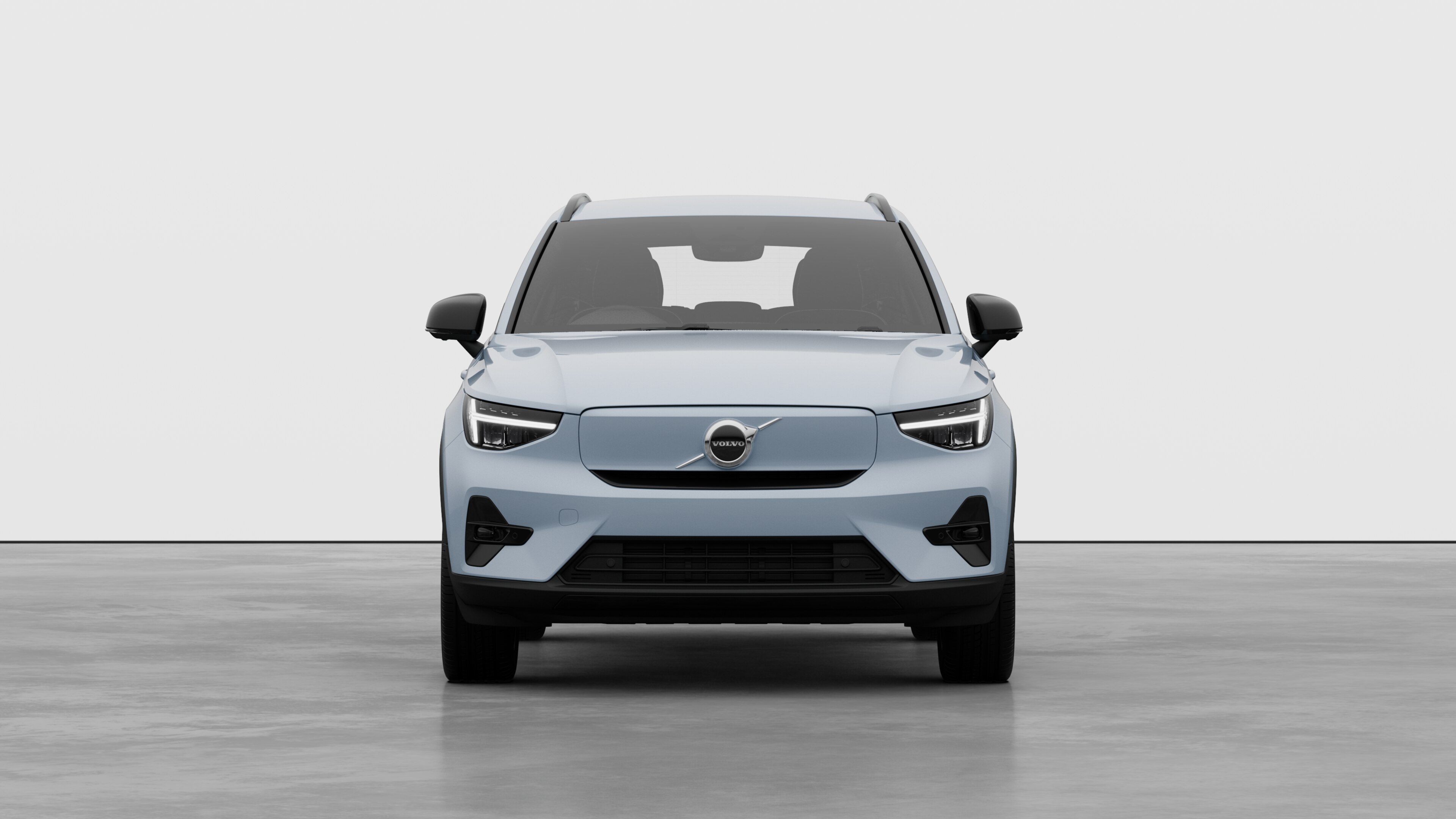 Front view of a Volvo car in a plain studio background.