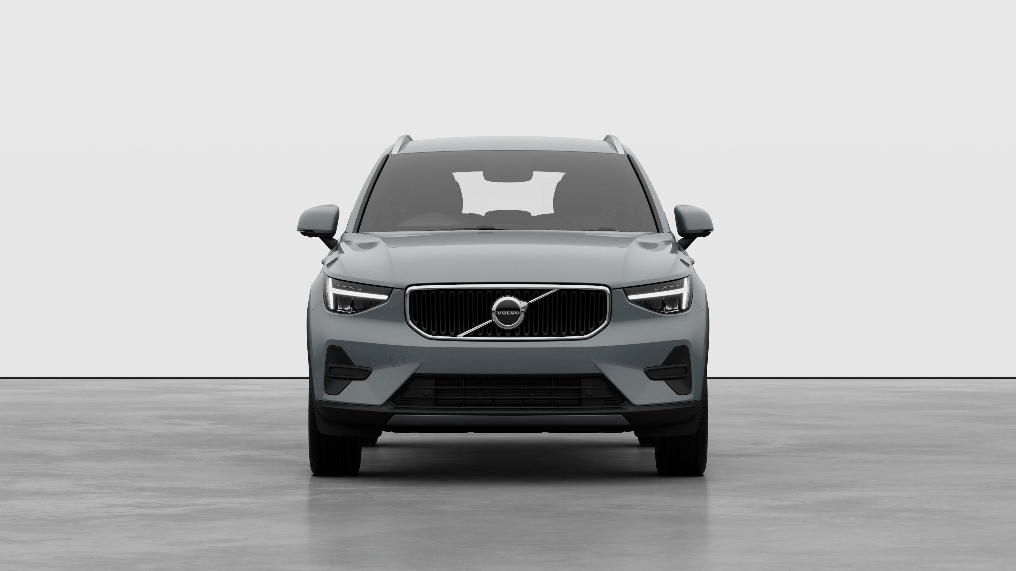 Front view of a Volvo car in a plain studio background.
