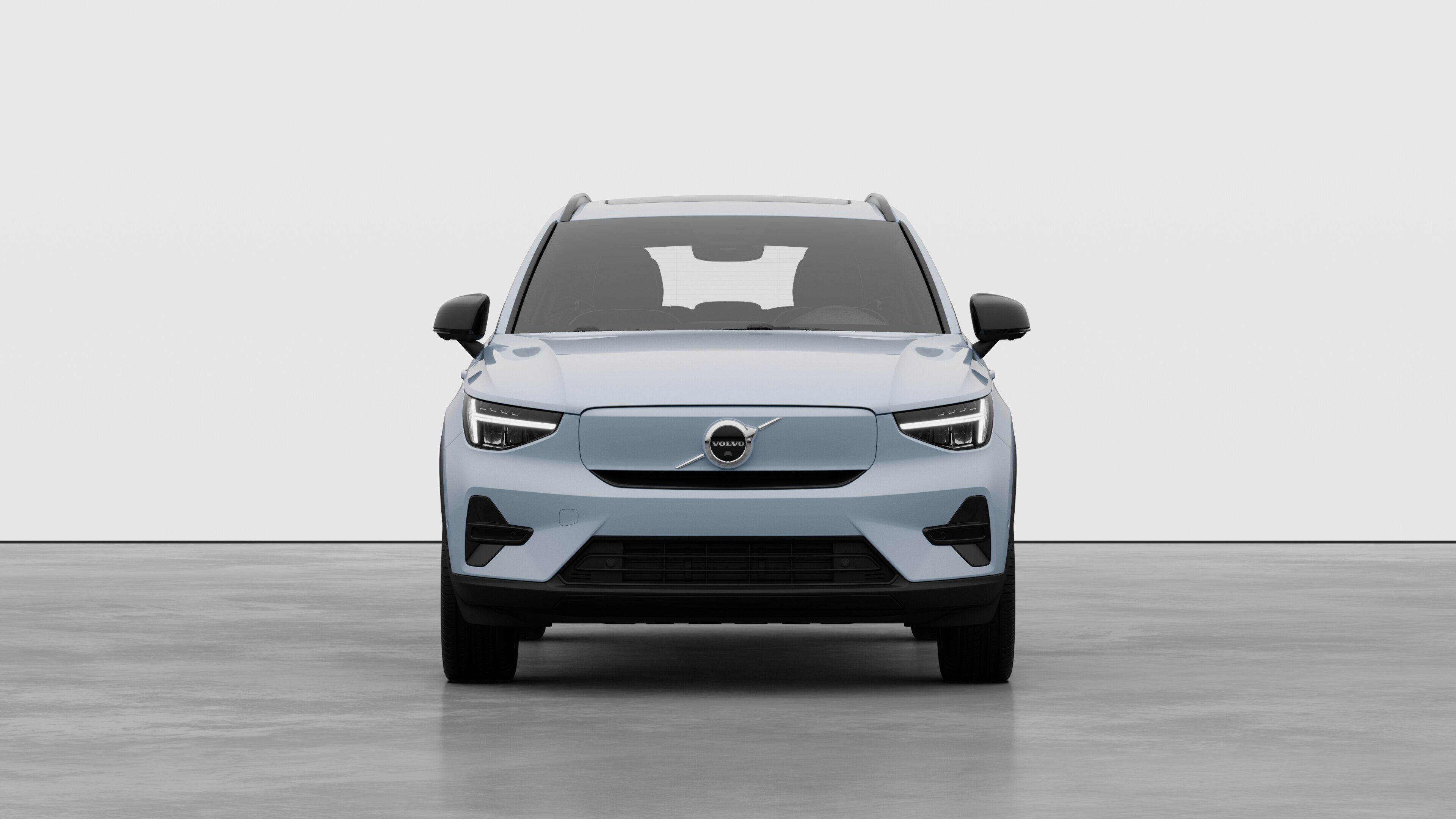 Front view of a Volvo car in a plain studio background.