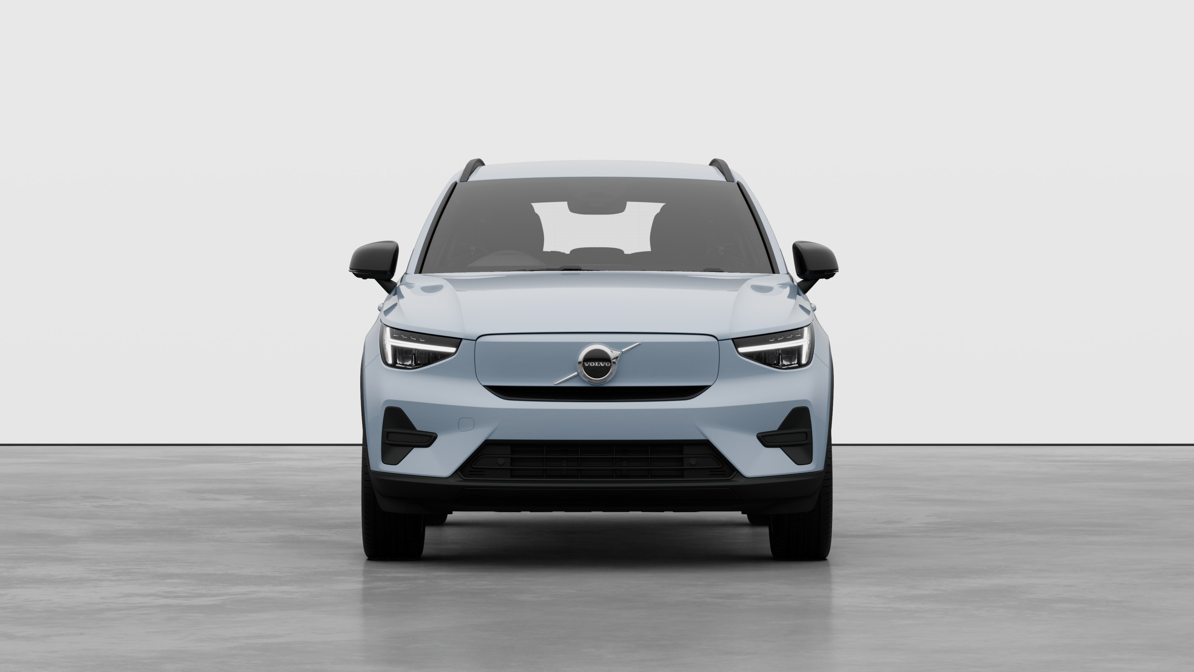 Front view of a Volvo car in a plain studio background.