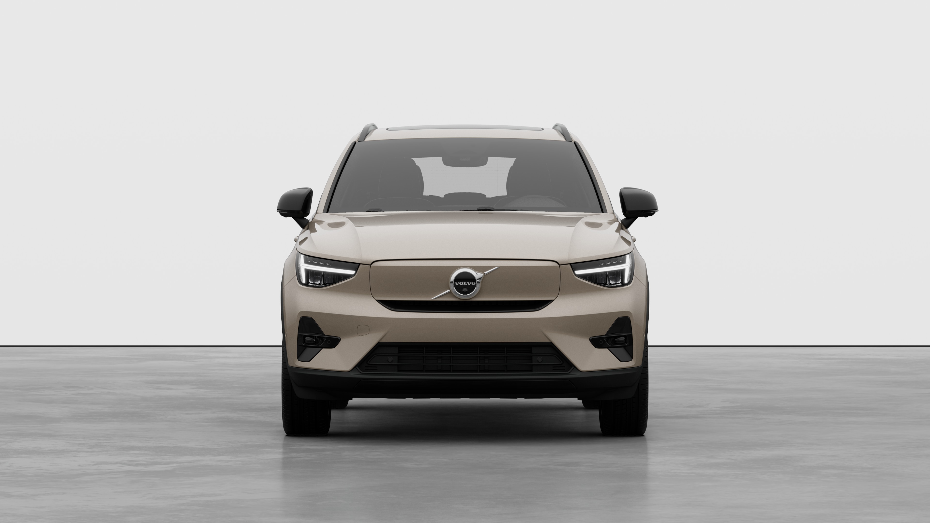 Front view of a Volvo car in a plain studio background.