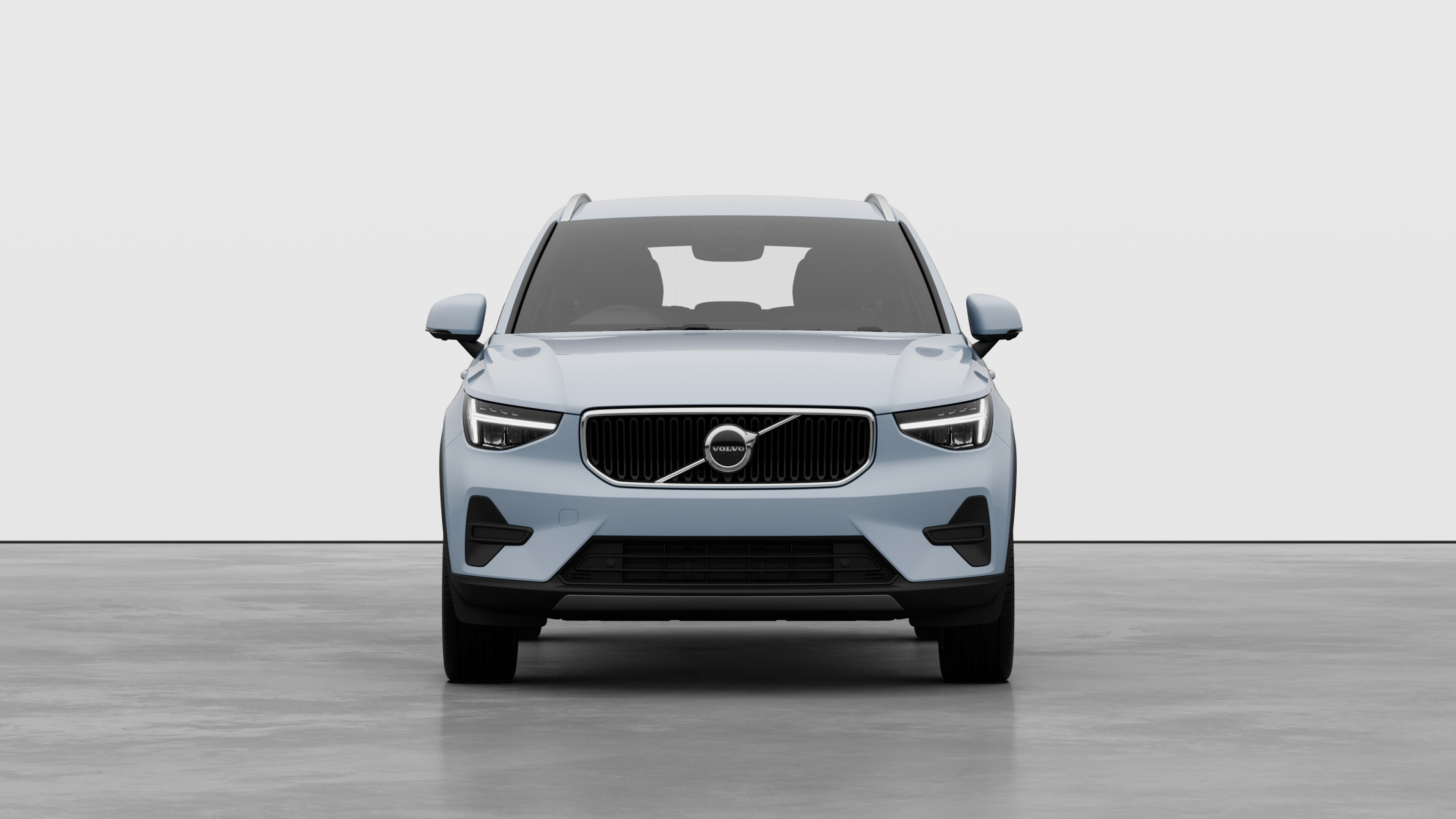 Front view of a Volvo car in a plain studio background.