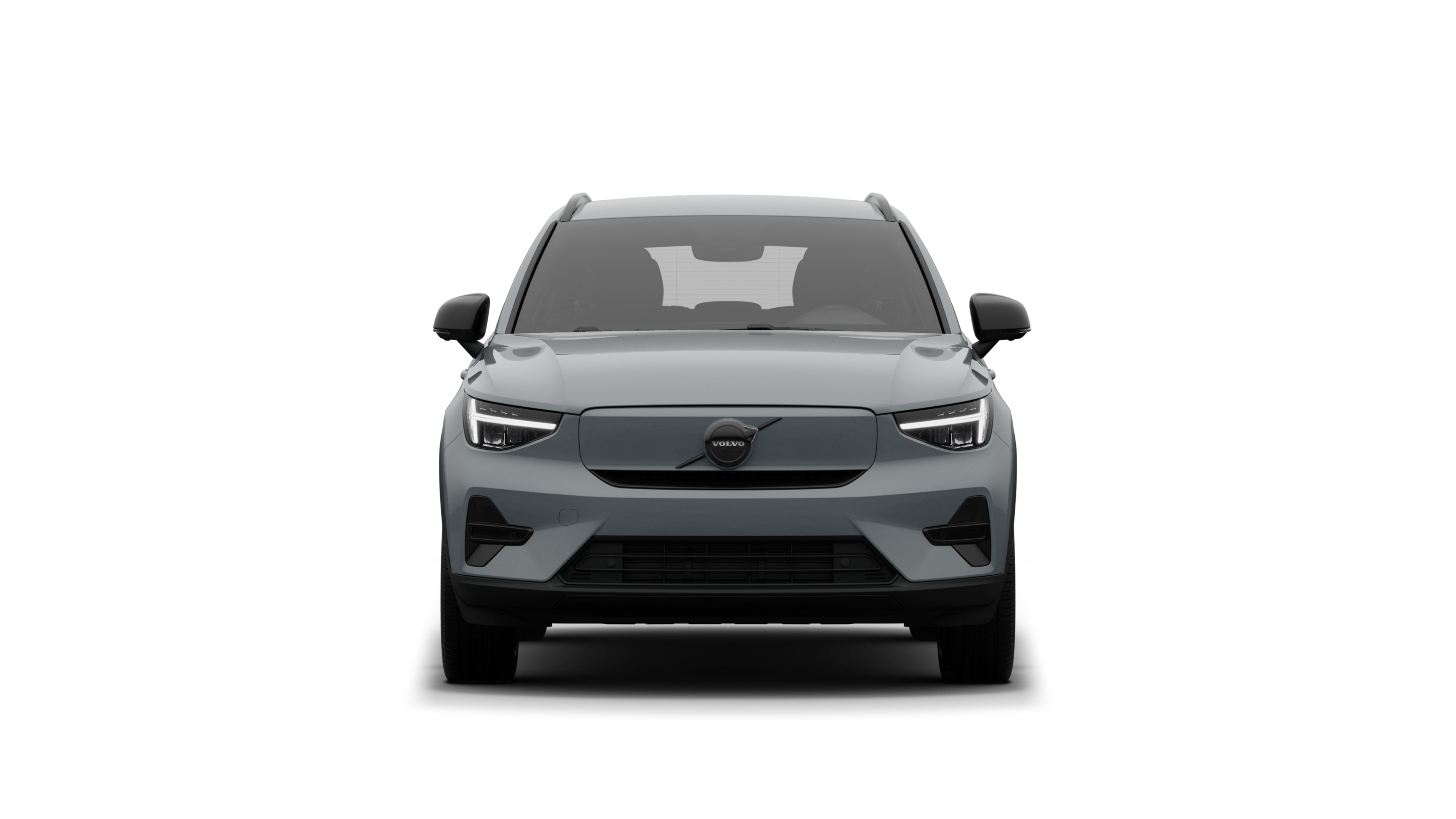 Vorderansicht eines Volvo vor dem Hintergrund eines schlichten Studios.