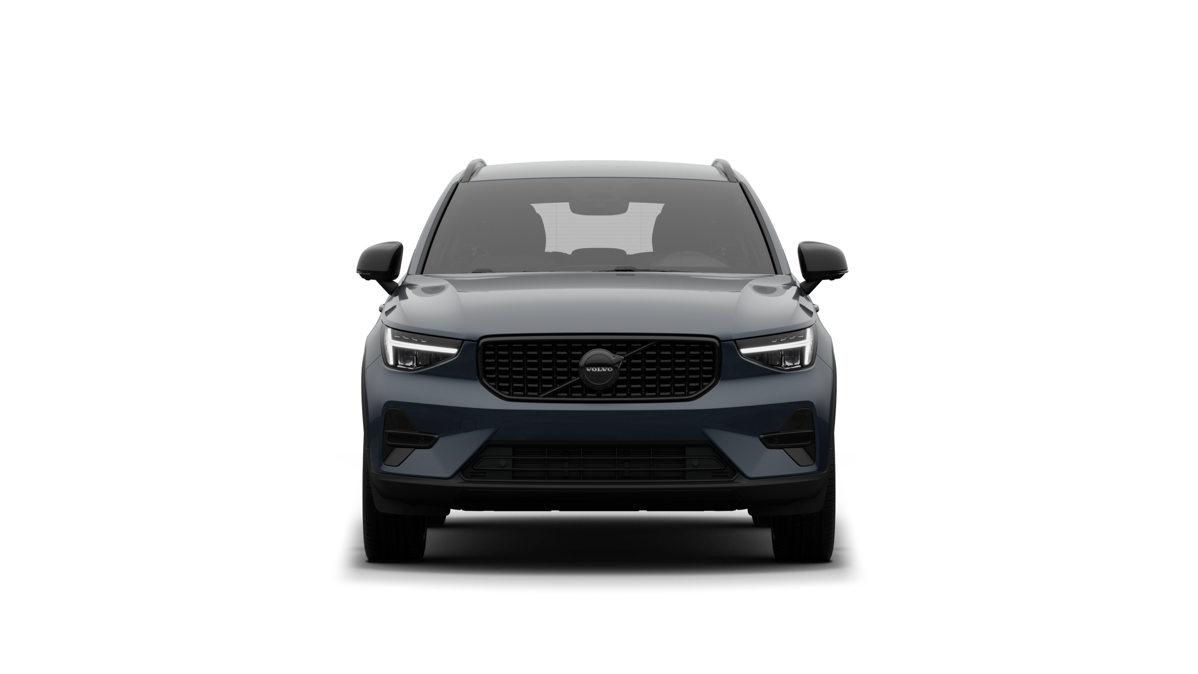 Vorderansicht eines Volvo vor dem Hintergrund eines schlichten Studios.