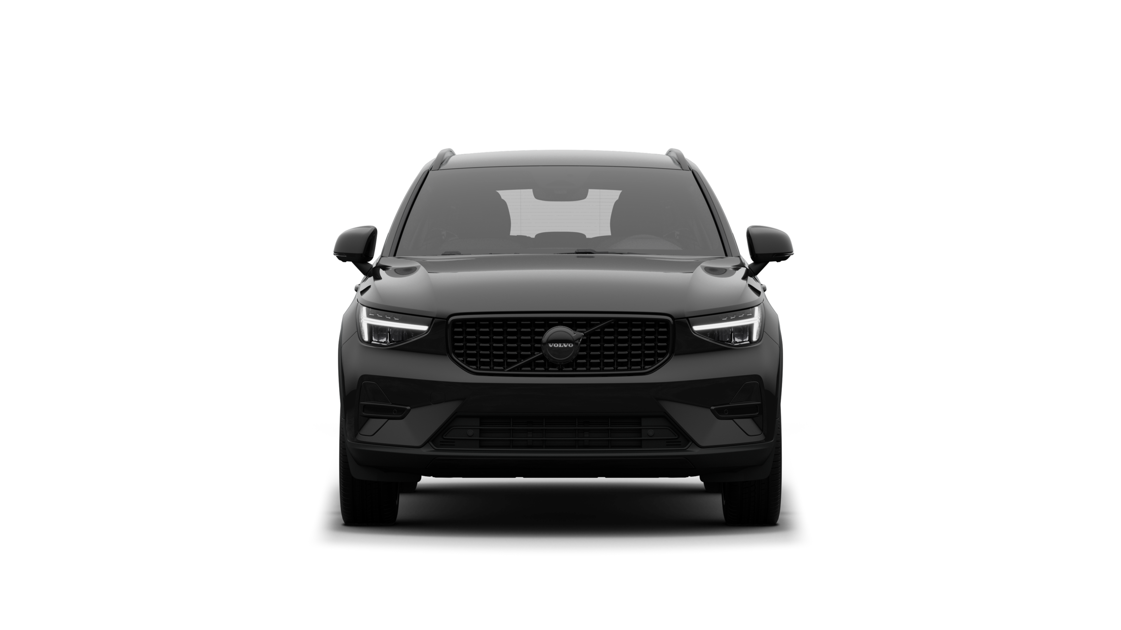 Vorderansicht eines Volvo vor dem Hintergrund eines schlichten Studios.