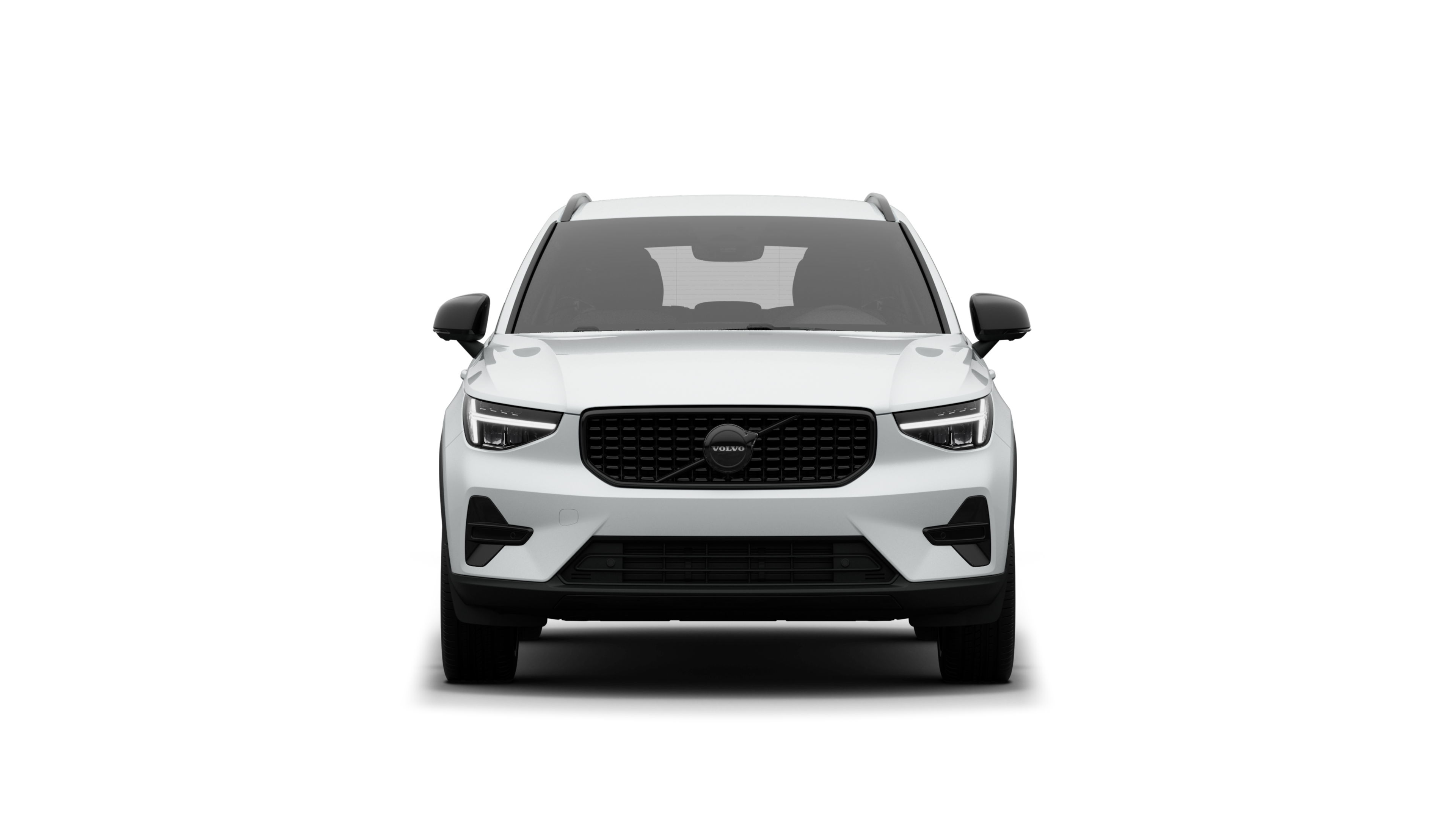 Vorderansicht eines Volvo vor dem Hintergrund eines schlichten Studios.