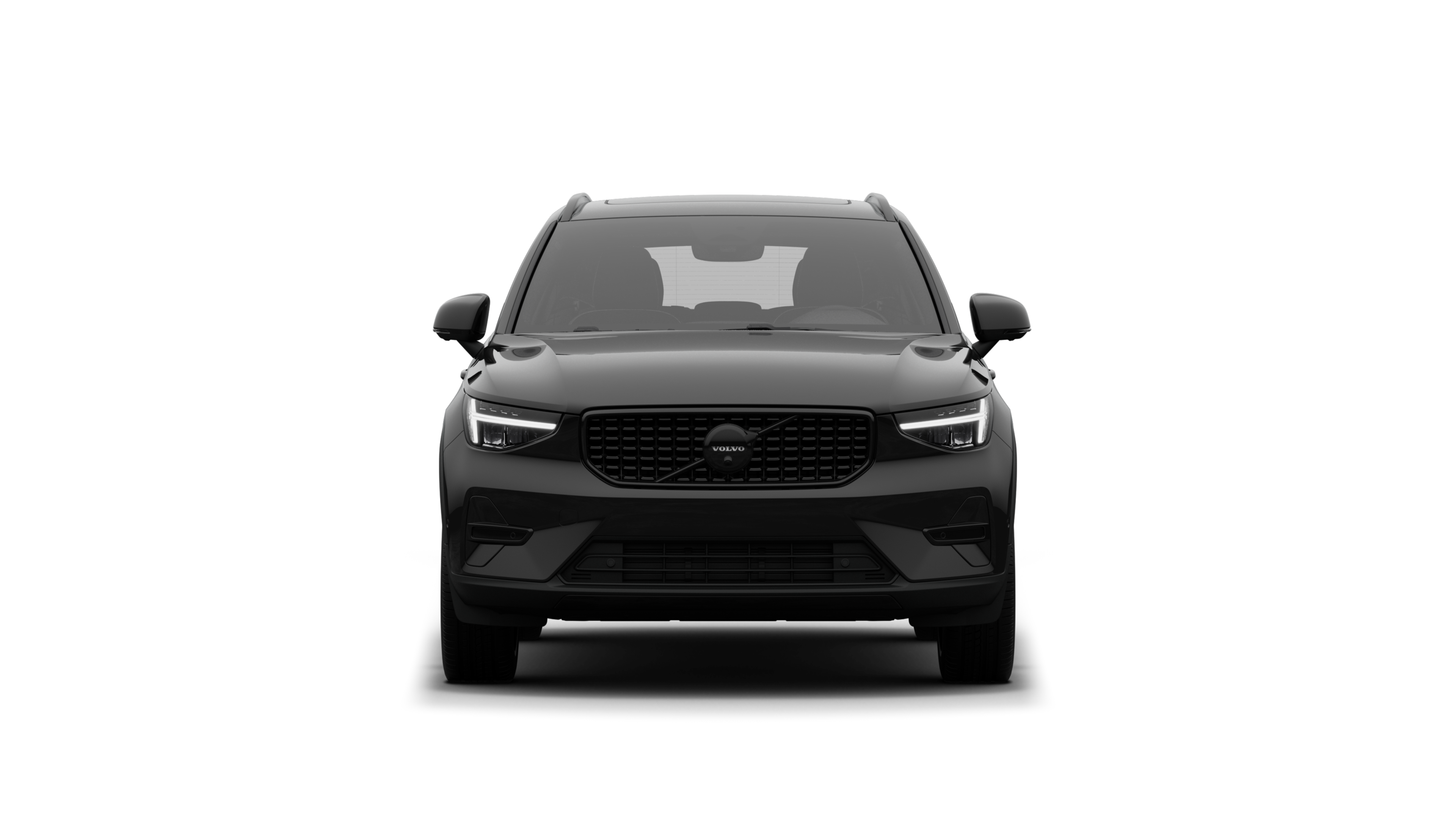 Widok samochodu Volvo z przodu na tle zwykłego studia