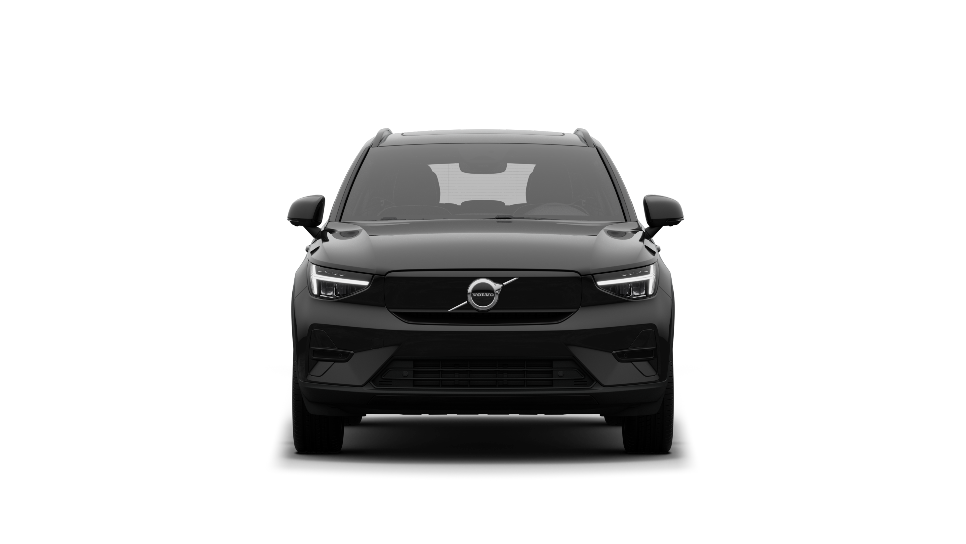 Vista frontal de un vehículo Volvo en un fondo de estudio liso.