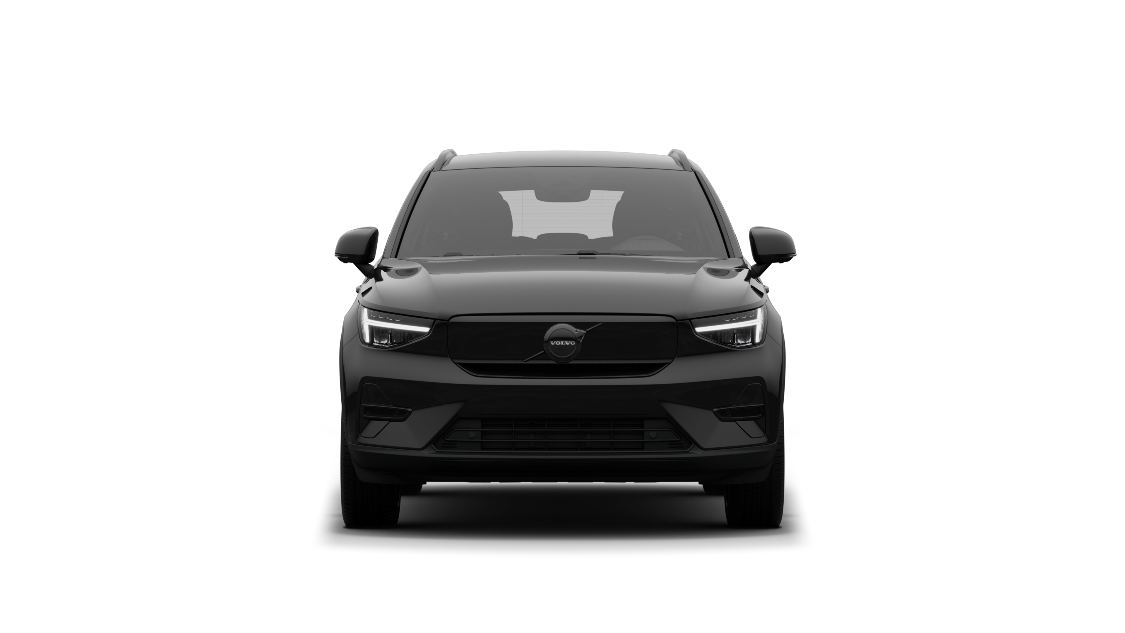 Widok samochodu Volvo z przodu na tle zwykłego studia