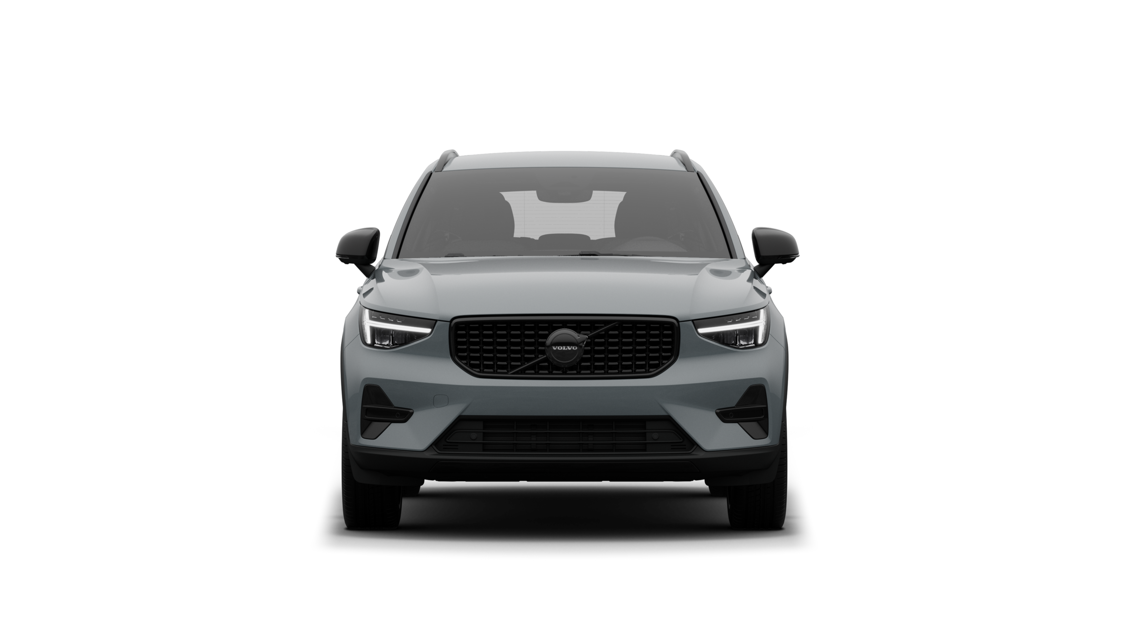 Vorderansicht eines Volvo vor dem Hintergrund eines schlichten Studios.