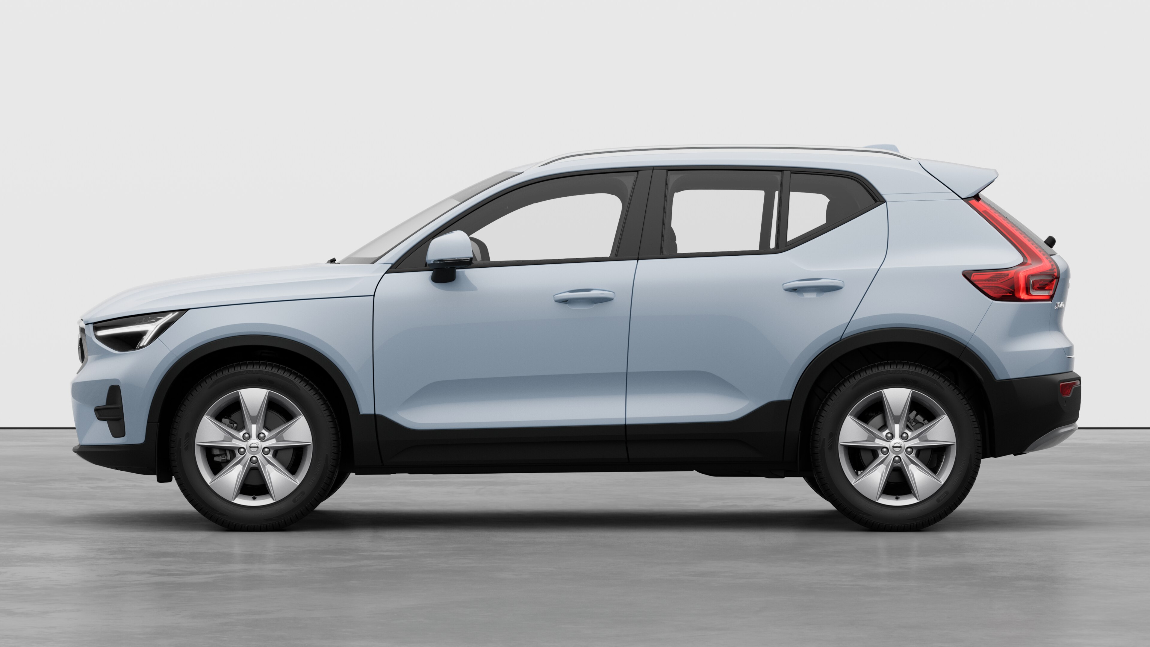 Automobil Volvo u bočnom pogledu na običnu studijsku pozadinu. Nema dodatnih detalja ili identifikatora.