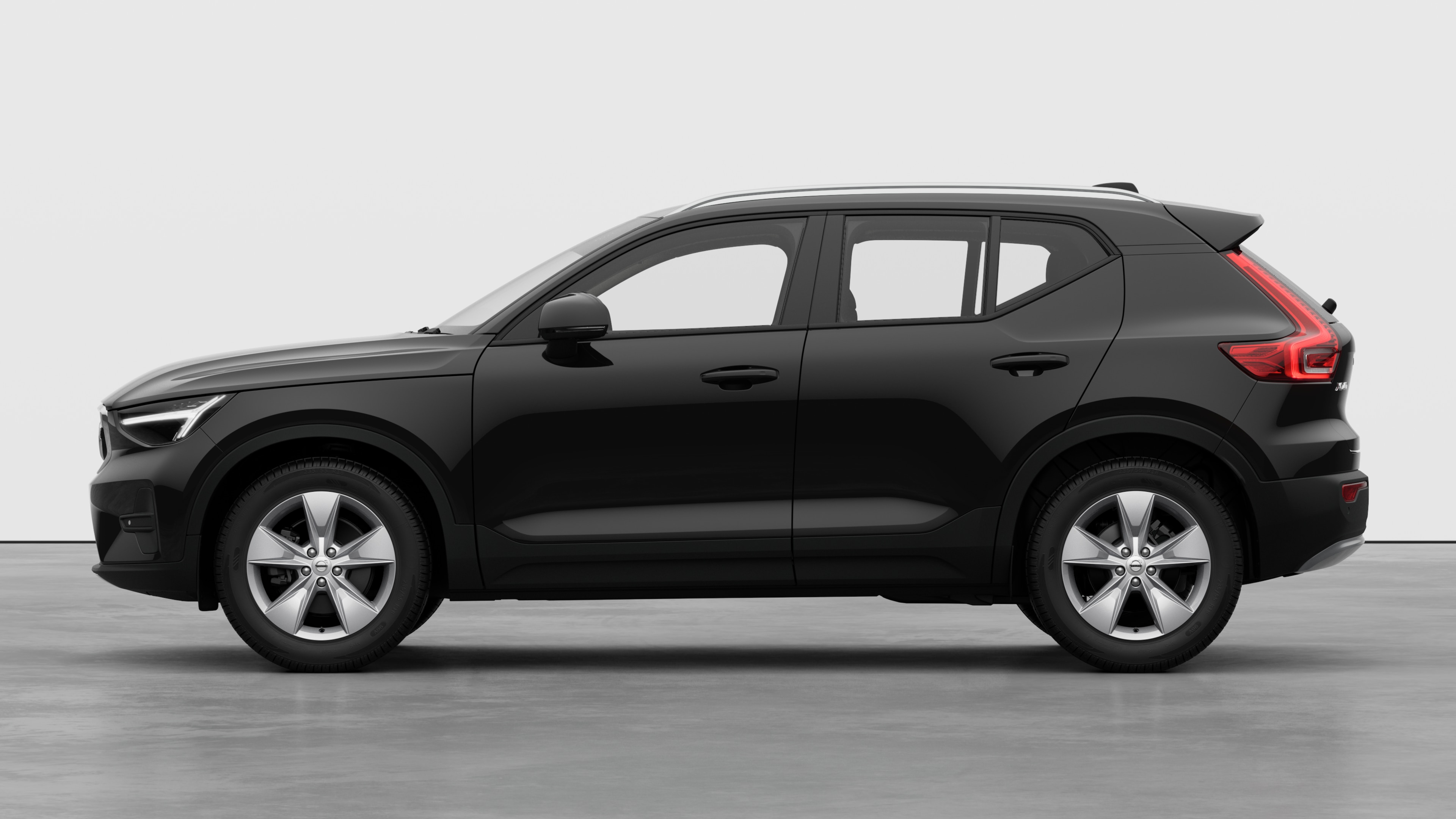 Volvo car in side view against a plain studio background. No additional details or identifiers are present.